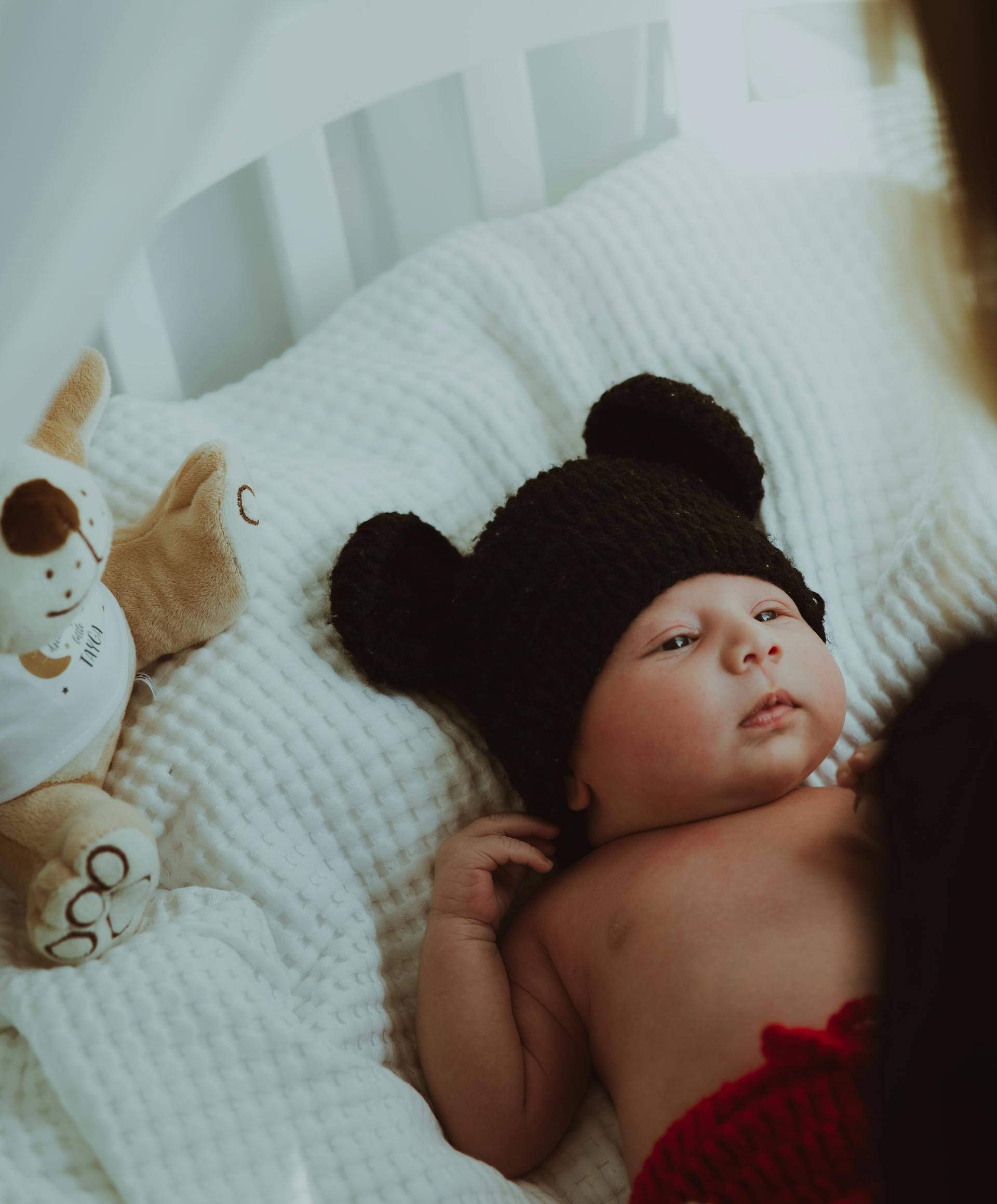 Un bébé dans son lit | Source : Pexels