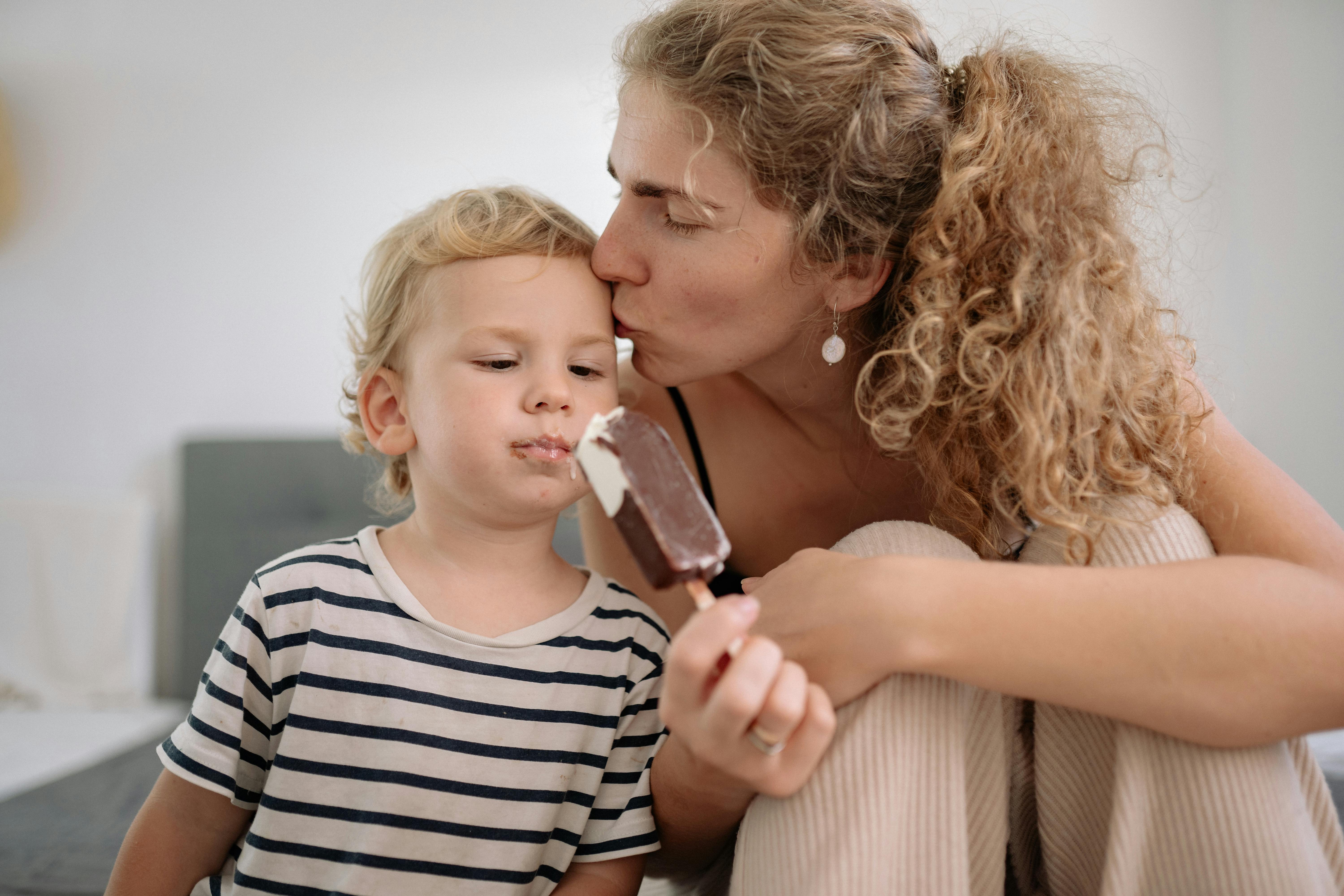 A happy woman with her son | Source: Pexels