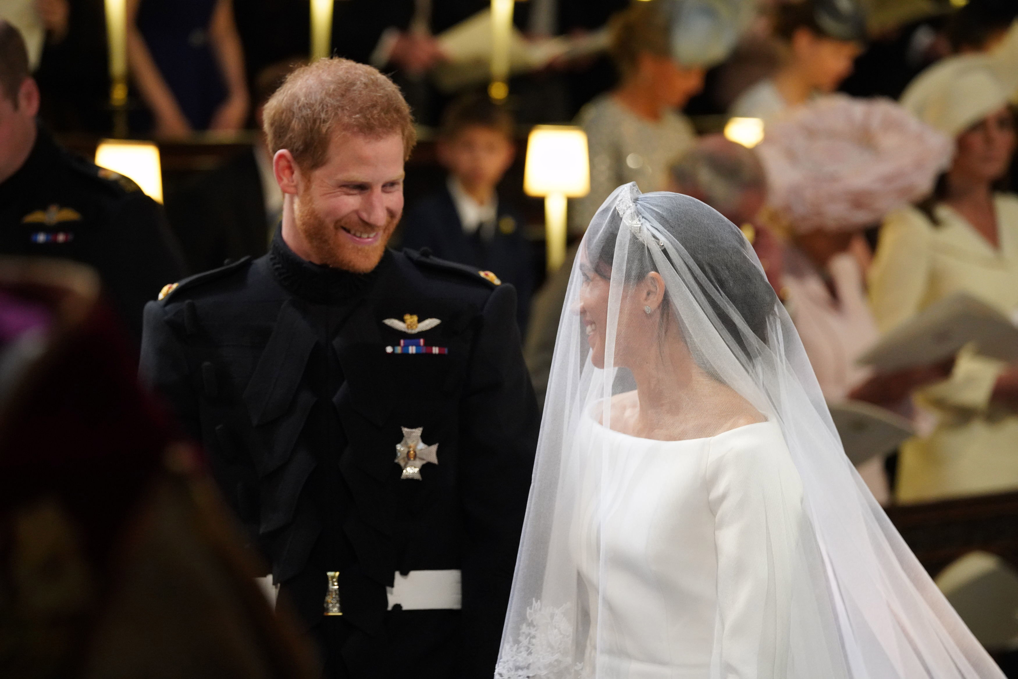 Le prince Harry avec sa promise Meghan Markle lors de leur mariage le 19 mai 2018 à Windsor, en Angleterre | Source : Getty Images