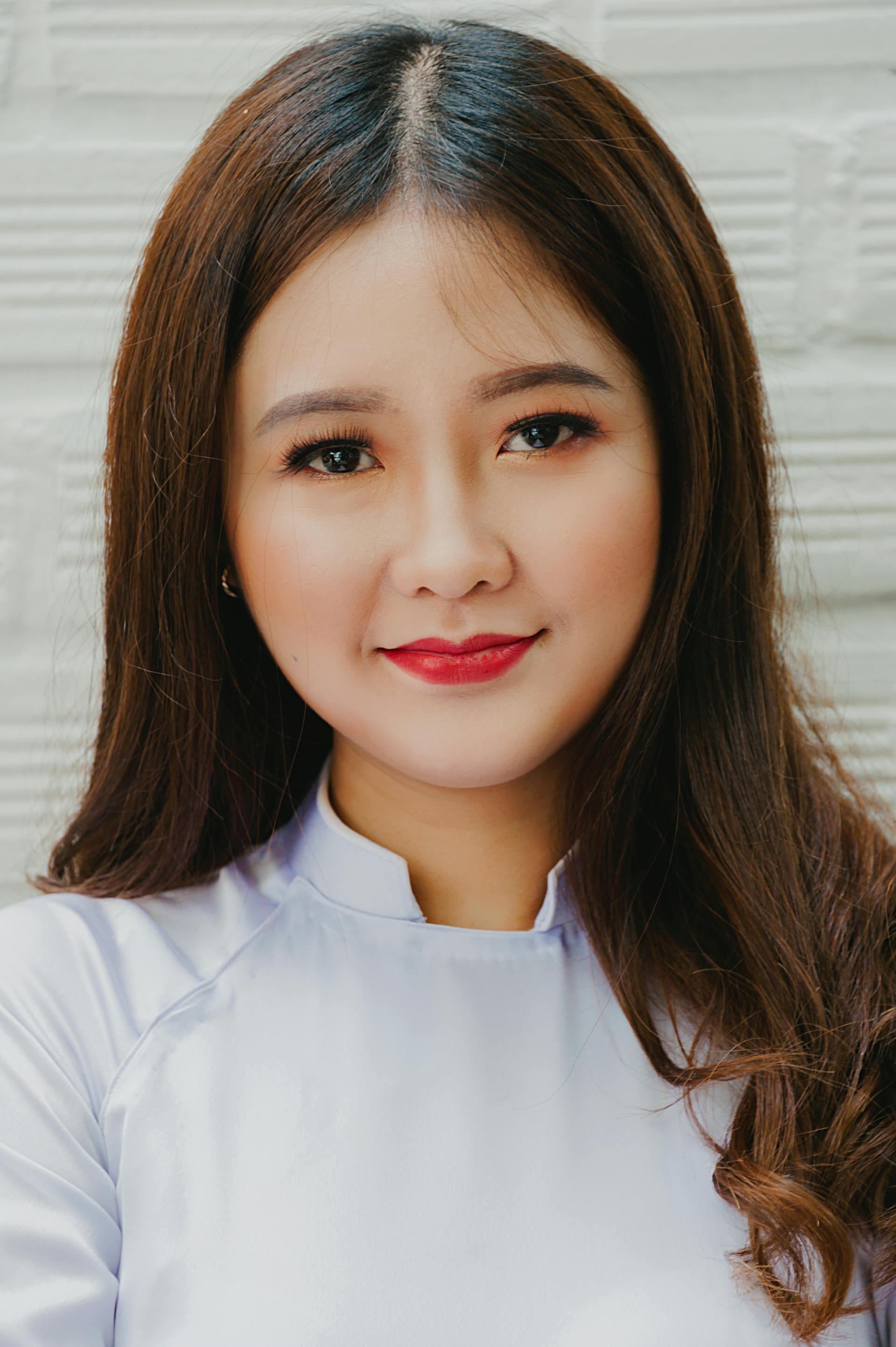 Une femme souriante | Source : Pexels