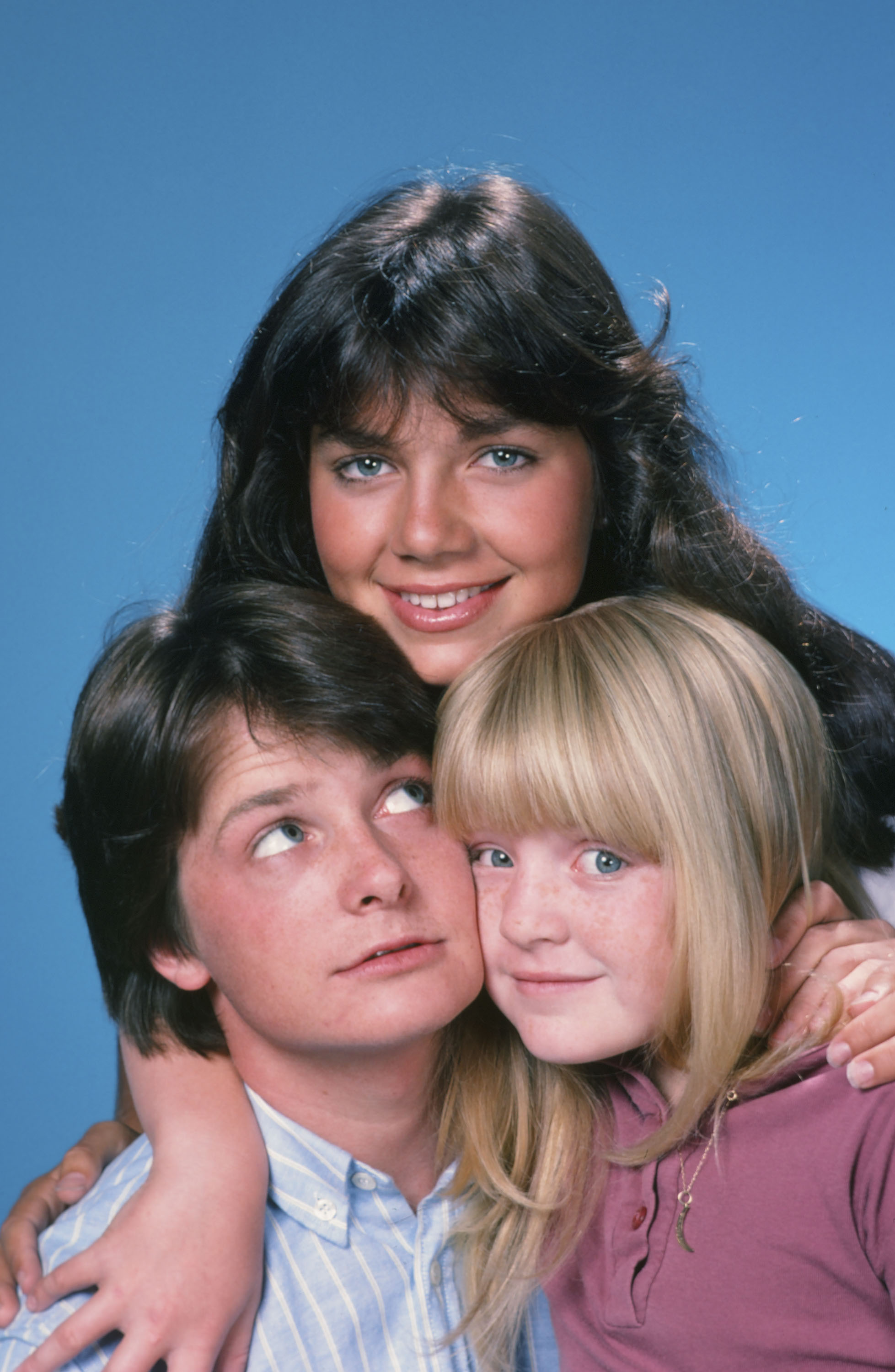 Michael J. Fox, Justine Bateman et Tina Yothers dans "Sacrée famille", circa 1980 | Source : Getty Images