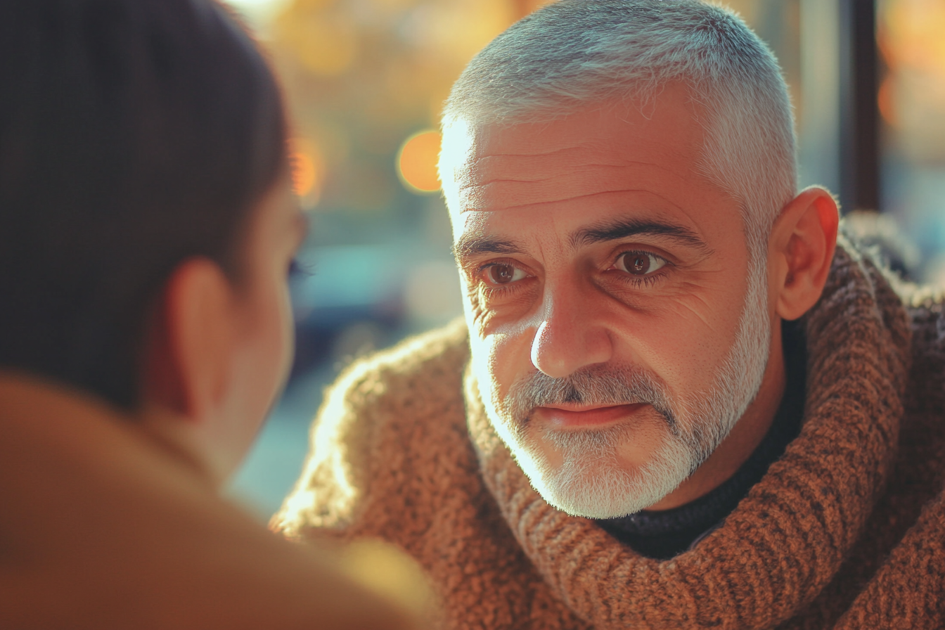 Un homme qui regarde une femme | Source : Midjourney