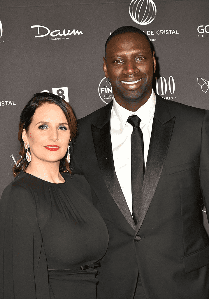 Hélène Sy et l'acteur Omar Sy, lauréat des Globes de Cristal, assistent à la 11ème cérémonie des Globes de Cristal Awards au Lido le 30 janvier 2017 à Paris, France. | Photo : Getty Images