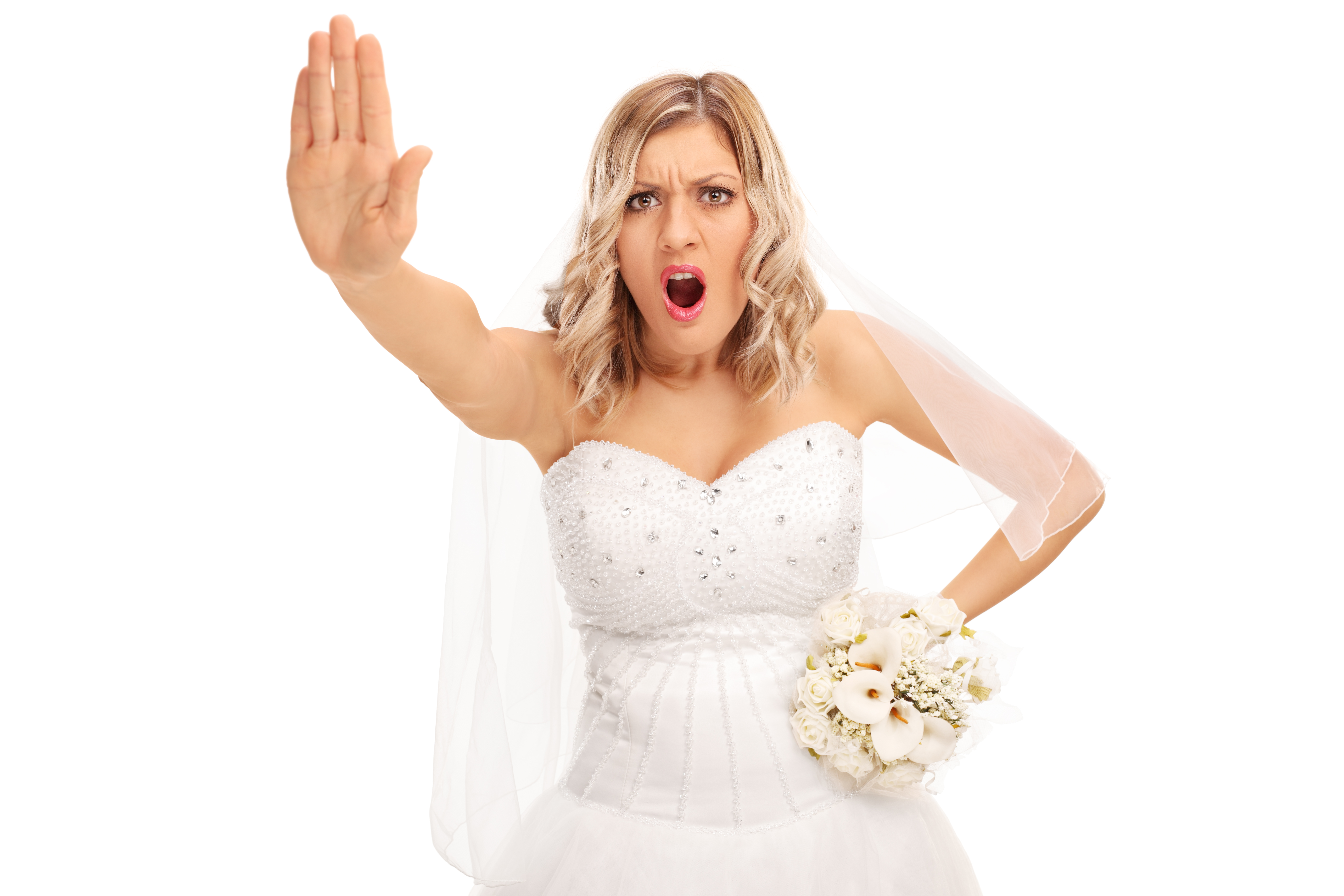 Mariée en colère avec la main levée indiquant "stop" | Source : Shutterstock