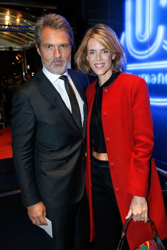 Julie Andrieu et son mari Stéphane Delajoux assistent à la première de "Knock" Paris au Cinéma UGC Normandie le 16 octobre 2017 à Paris, France. | Photo : Getty Images