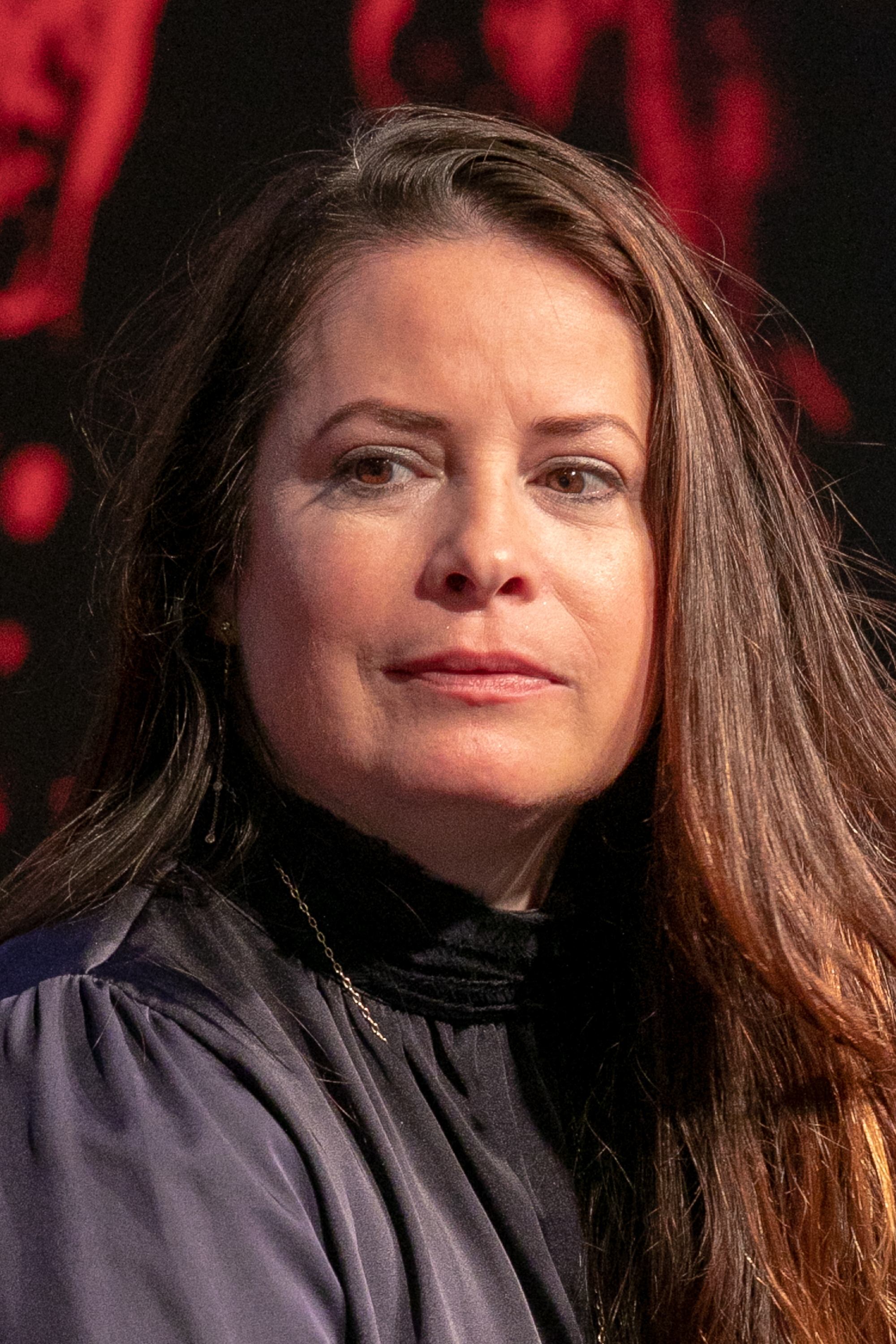 Holly Marie Combs à la conférence "Charmed" lors du salon Manga &amp; Sci-Fi le 20 octobre 2018, à Paris, France | Source : Getty Images