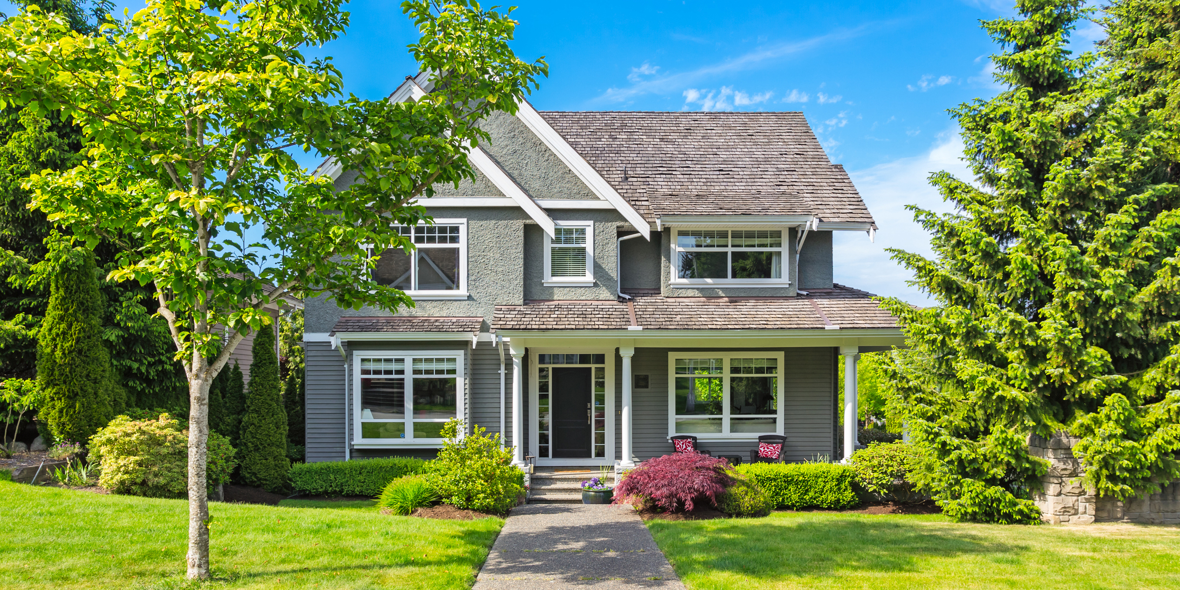 Une maison de banlieue | Source : Shutterstock