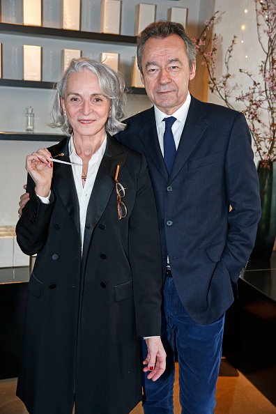 Martine Denisot et son mari Michel Denisot à Paris dans la boutique Liquide le 17 mars 2016.  | Photo : Getty Images