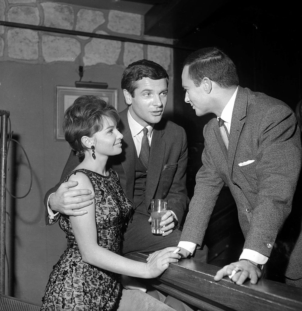 Françoise Arnoul, Paul Guers et Francois Patrice à Paris, Club de Saint-Hilaire, 1964. | Photo : Getty Images