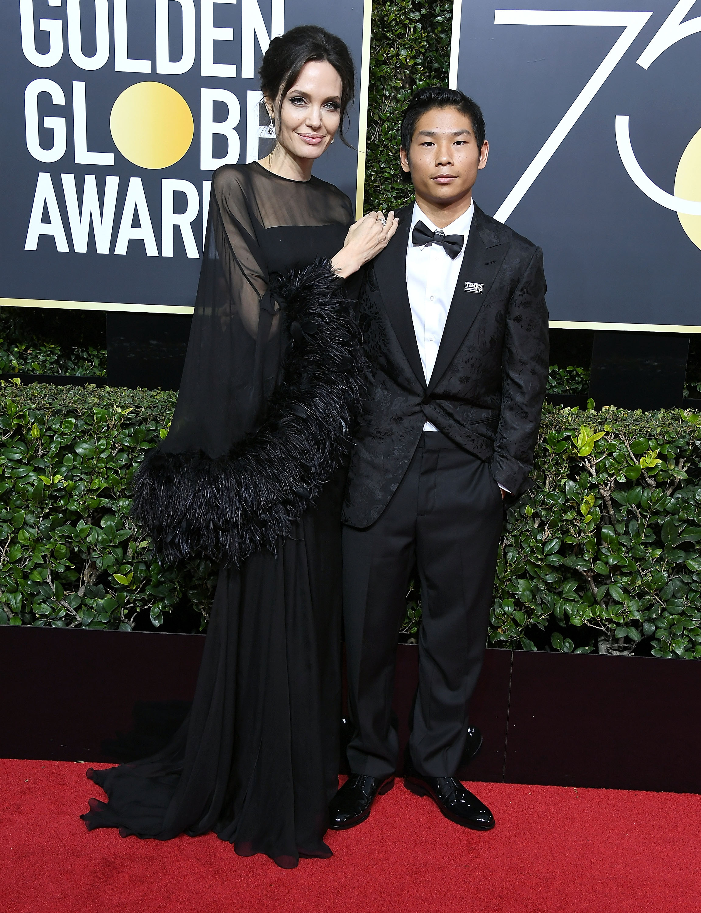 Angelina Jolie et Pax Jolie-Pitt lors de la 75e cérémonie annuelle des Golden Globe Awards à l'hôtel Beverly Hilton, le 7 janvier 2018, en Californie. | Source : Getty Images