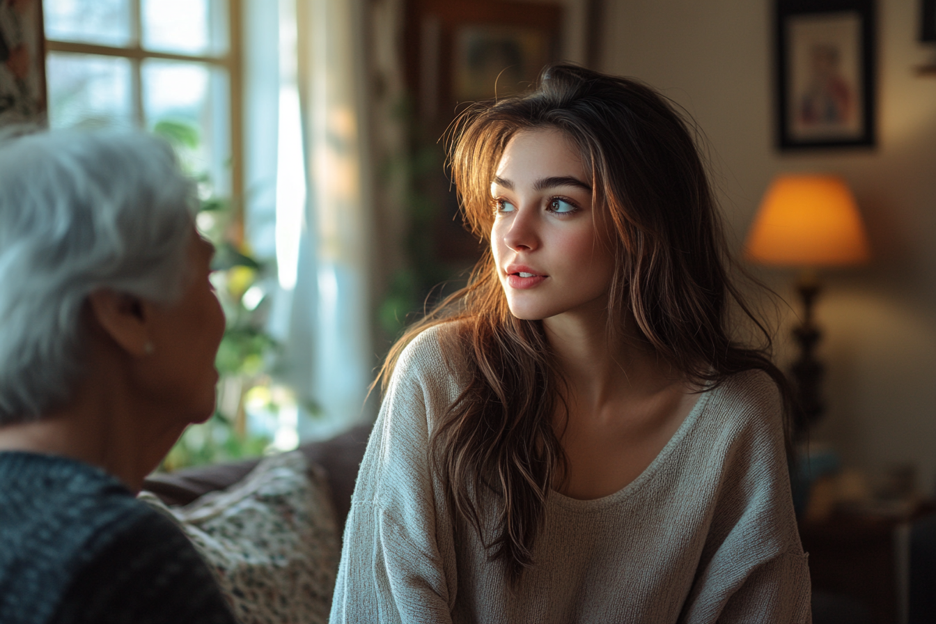 Une jeune femme et une femme âgée en pleine conversation | Source : Midjourney