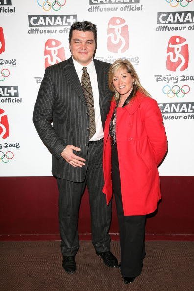 David Douillet et son épouse Valérie au Gaumont Marignan le 24 janvier 2008 à Paris, France. | Photo : Getty Images