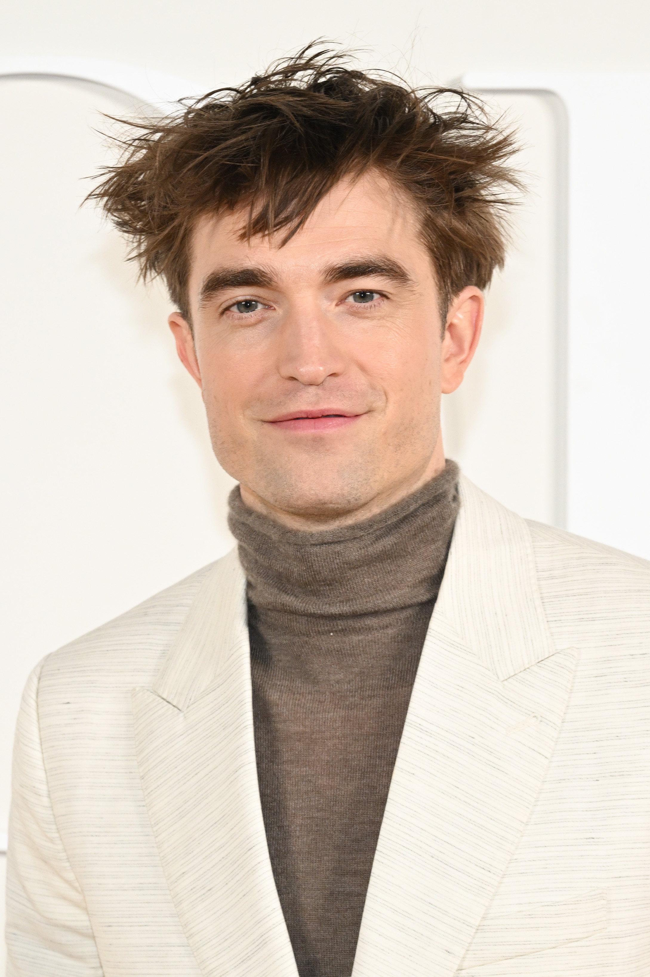 Robert Pattinson assiste au défilé Dior Fall 2023 Menswear Show le 3 décembre 2022, à Gizeh, en Égypte. | Source : Getty Images