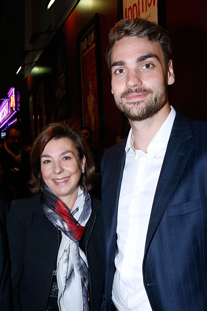  Son of Yves Montand, Valentin Livi and his mother Carole Amiel attend the "Ivo Livi ou le destin d'Yves Montand" : Theater Play at Theatre de la Gaite Montparnasse on October 11, 2016 in Paris, France. | Photo : Getty Images