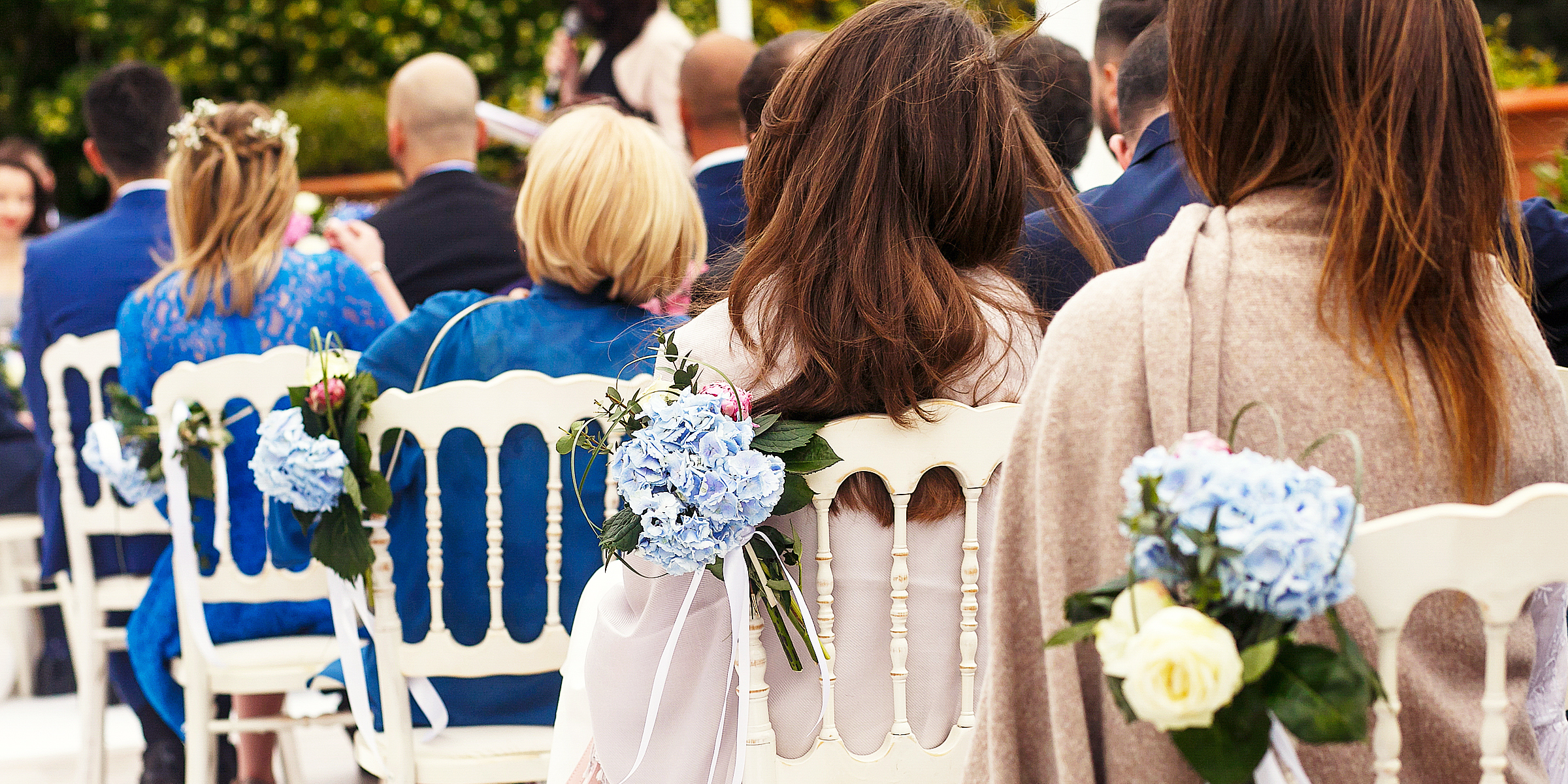 Des gens à un mariage | Source : Shutterstock