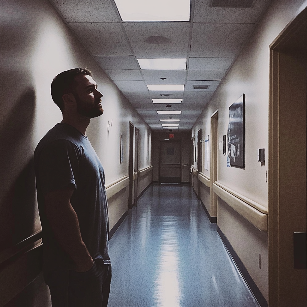 Un homme debout dans un couloir d'hôpital | Source : Midjourney