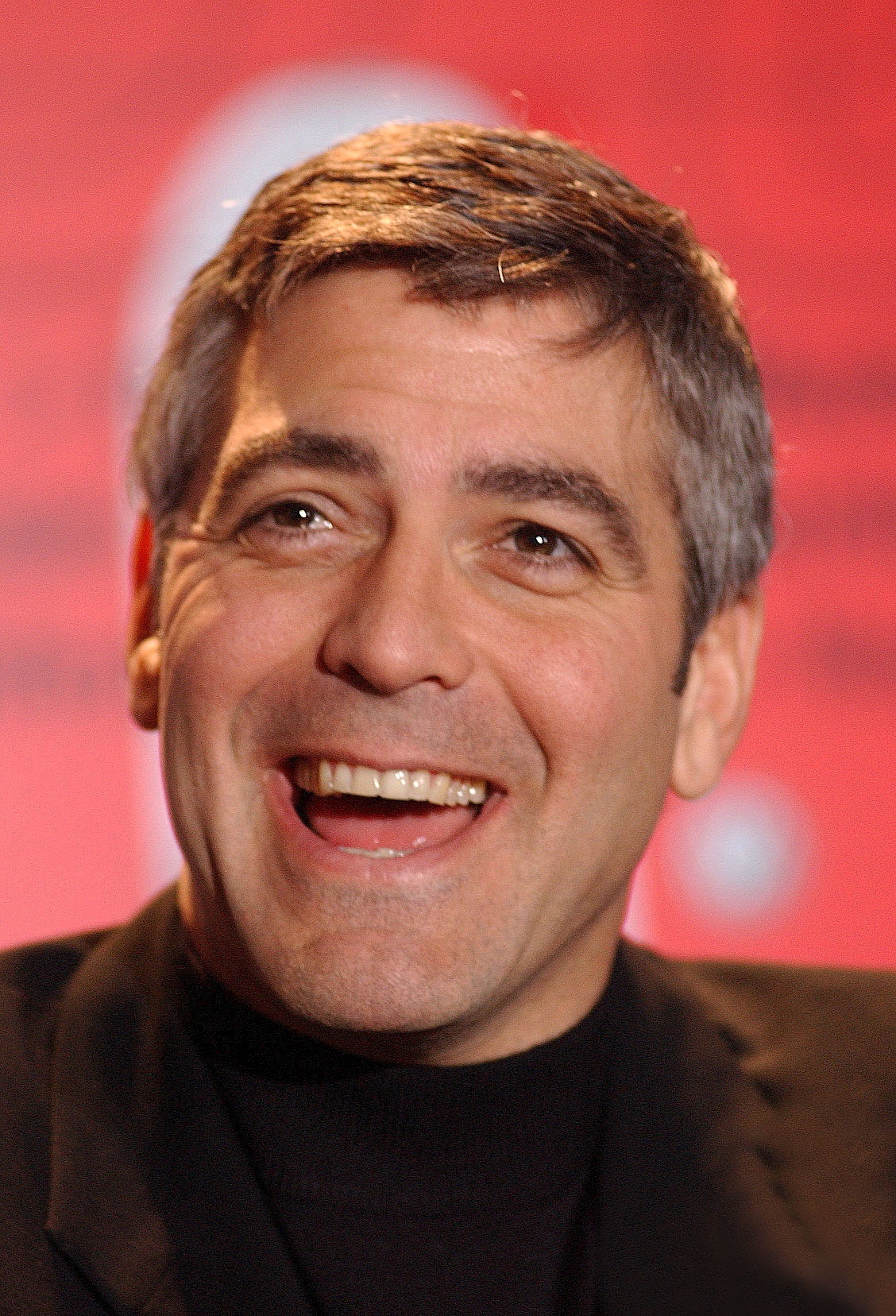 George Clooney photographié à Berlin, Allemagne, le 8 février 2003. | Source : Getty Images