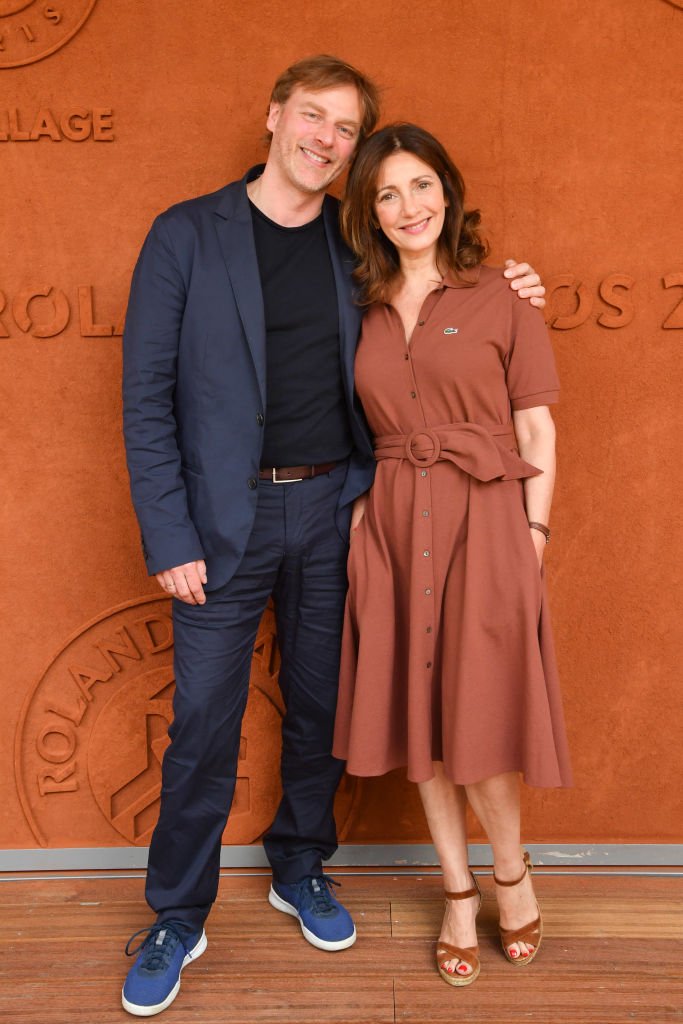Les acteurs Valerie Karsenti et son mari François Feroleto assistent à la septième journée de Roland Garros le 2 juin 2018 à Paris, en France. | Photo : Getty Images.