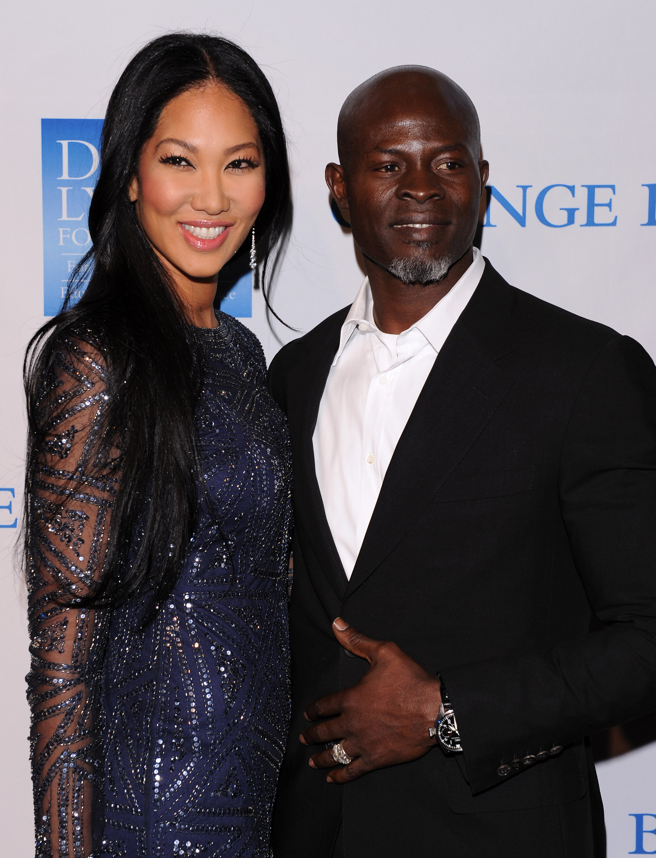 Kimora Lee Simmons et Djimon Hounso lors de la 3e célébration annuelle de bienfaisance "Le changement commence à l'intérieur", le 3 décembre 2011, à Los Angeles, Californie | Source : Getty Images