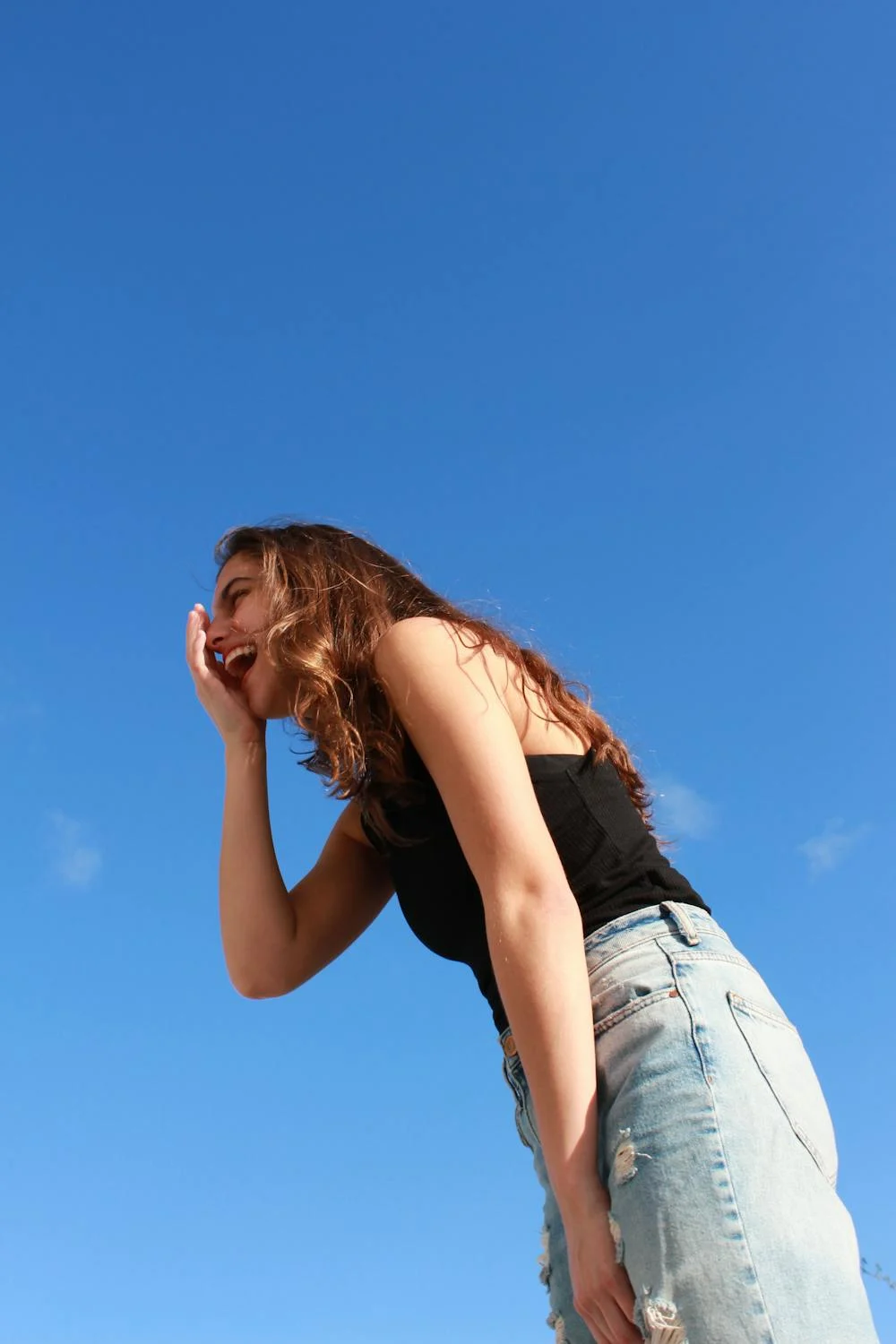 Une jeune femme heureuse | Source : Pexels