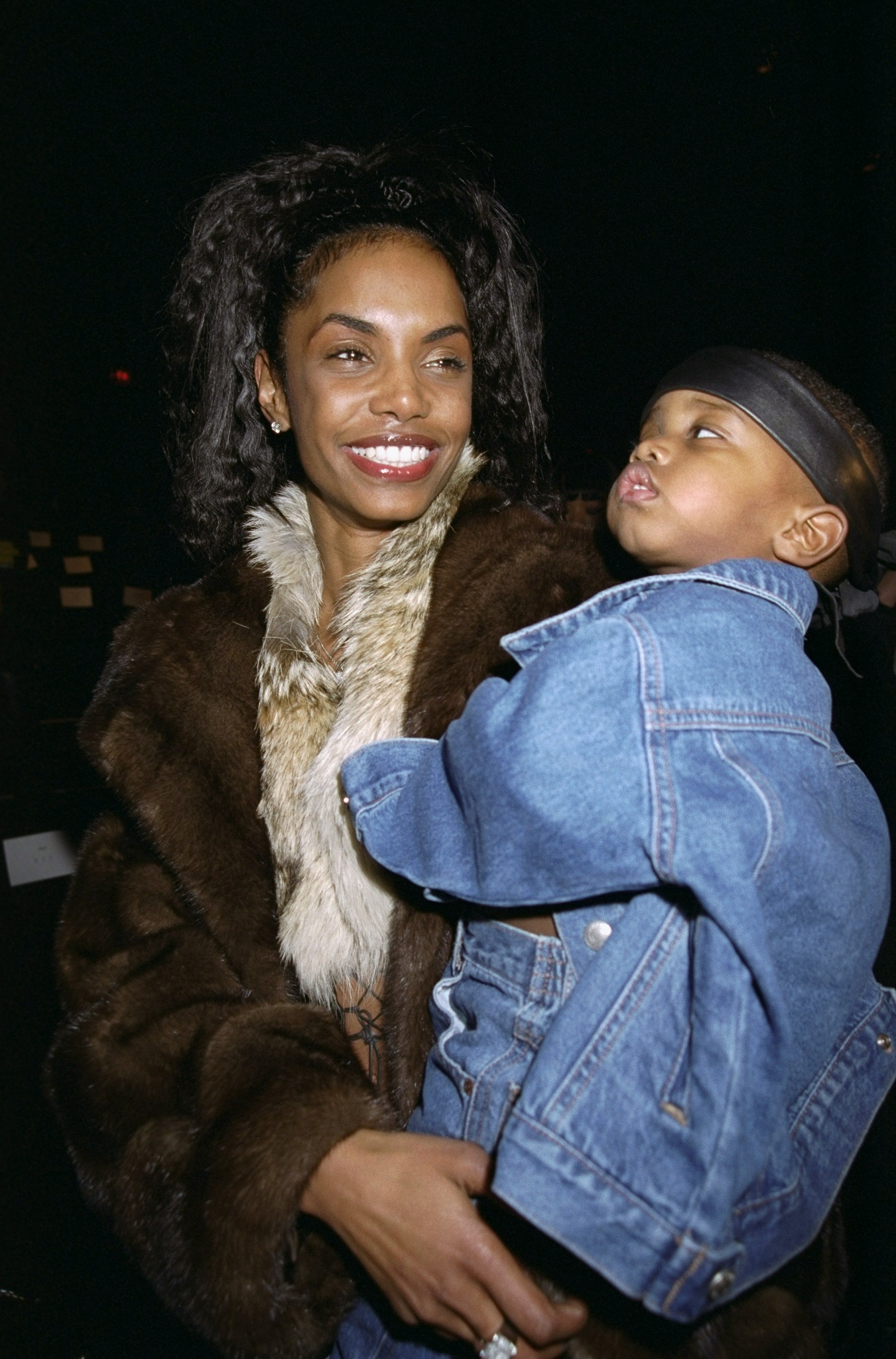 Kimberly Porter et Christian Combs au défilé de mode de Sean John le 1er janvier 2000 à Bryant Park, New York. | Source : Getty Images