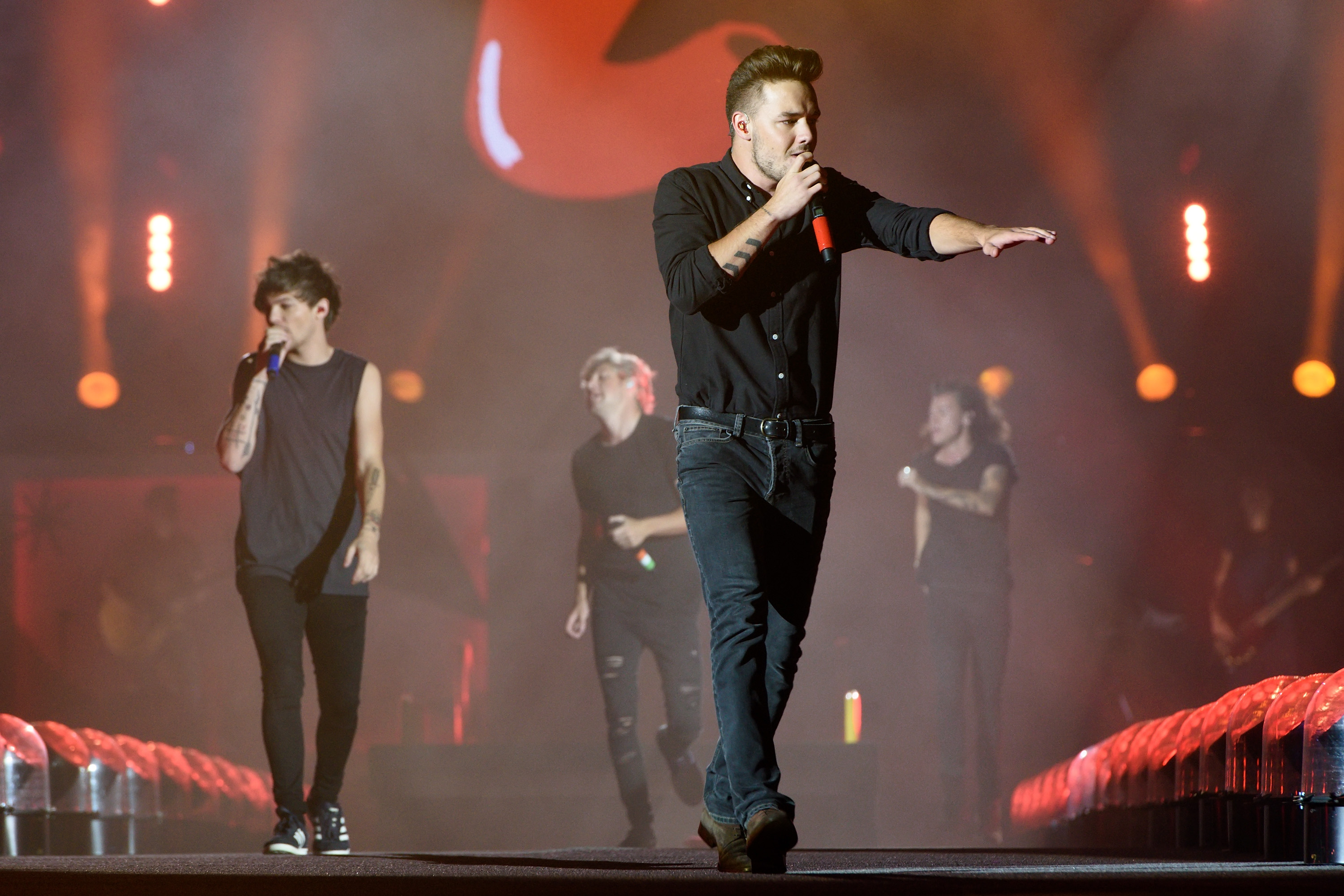 Louis Tomlinson, Niall Horan, Liam Payne et Harry Styles se produisent au Soldier Field de Chicago le 23 août 2015 | Source : Getty Images