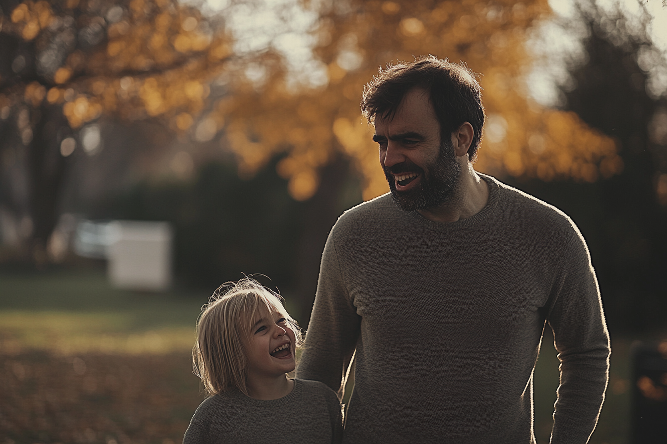 Un homme et sa fille au parc | Source : Midjourney