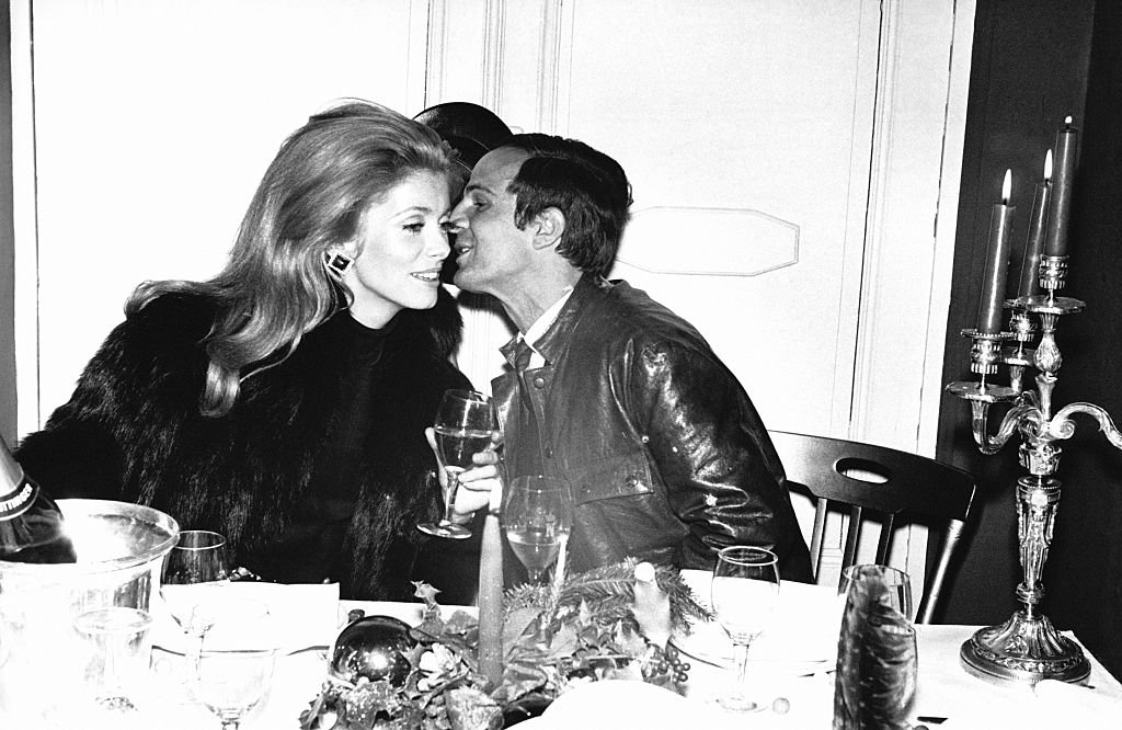 Catherine Deneuve et François Truffaut à une soirée. | Photo : Getty Images