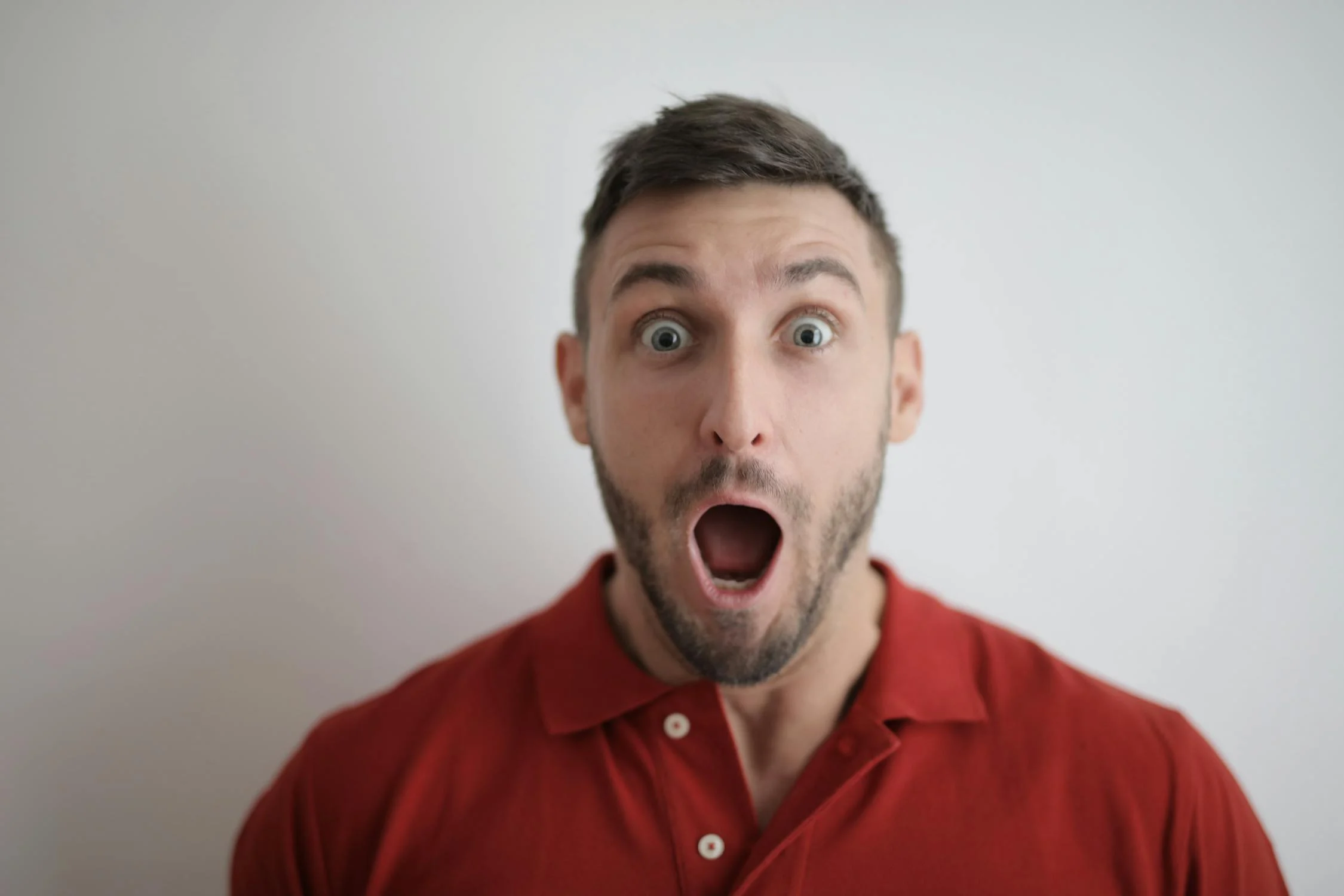 A shocked but happy man | Source: Pexels