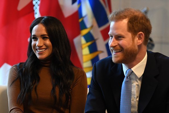 Le prince Harry et Meghan lors de leur visite à la Maison du Canada. | Photo : Getty Images