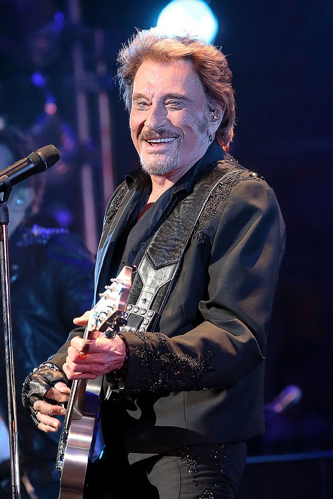 Le chanteur Johnny Hallyday se produit en concert au Beacon Theatre le 6 mai 2014 à New York | Source | Source : GettyImages.