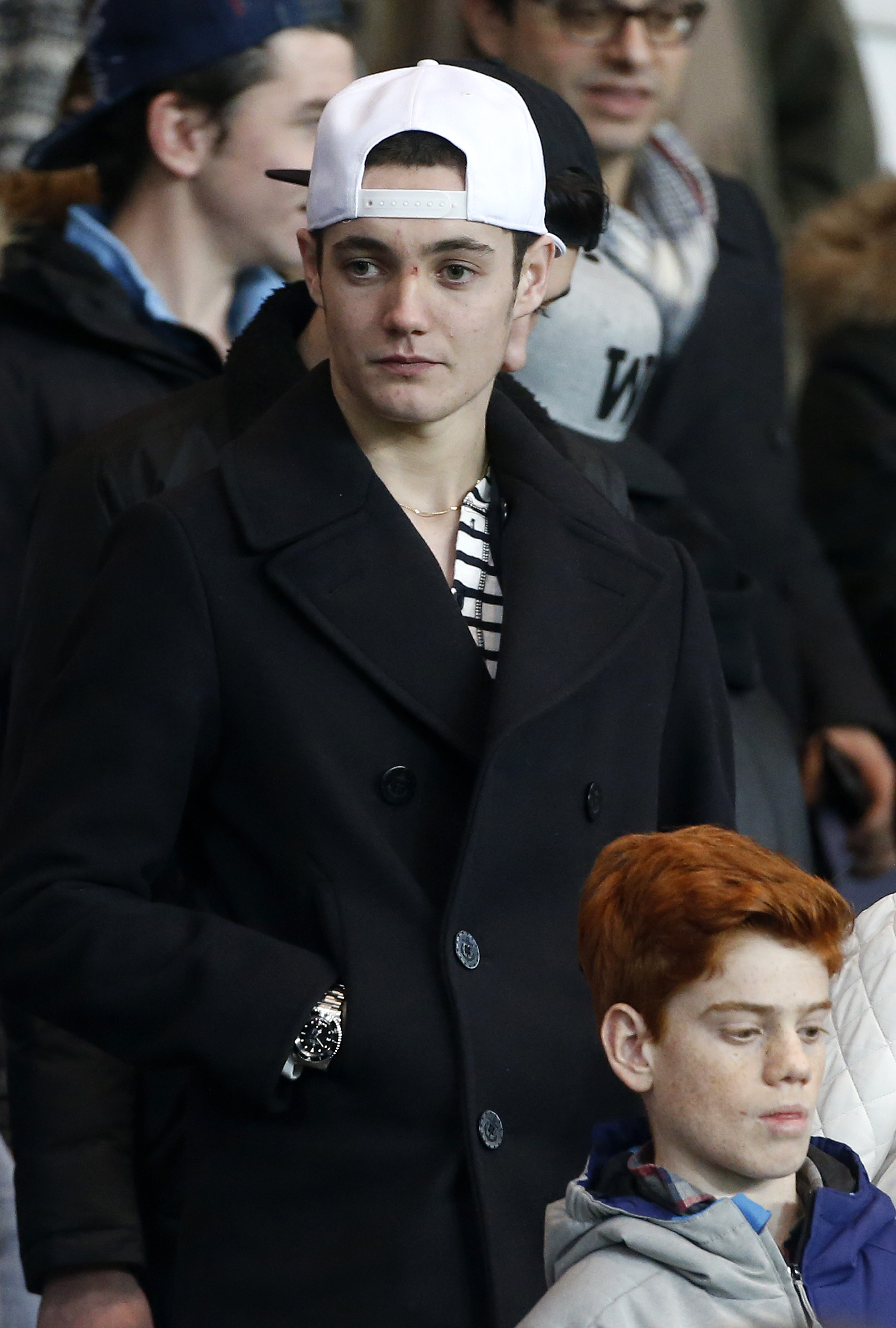 Louis Sarkozy assiste au match de Ligue 1 entre le Paris Saint-Germain FC et le Montpellier Hérault SC au Parc des Princes, le 20 décembre 2014 à Paris, en France I Source : Getty Images