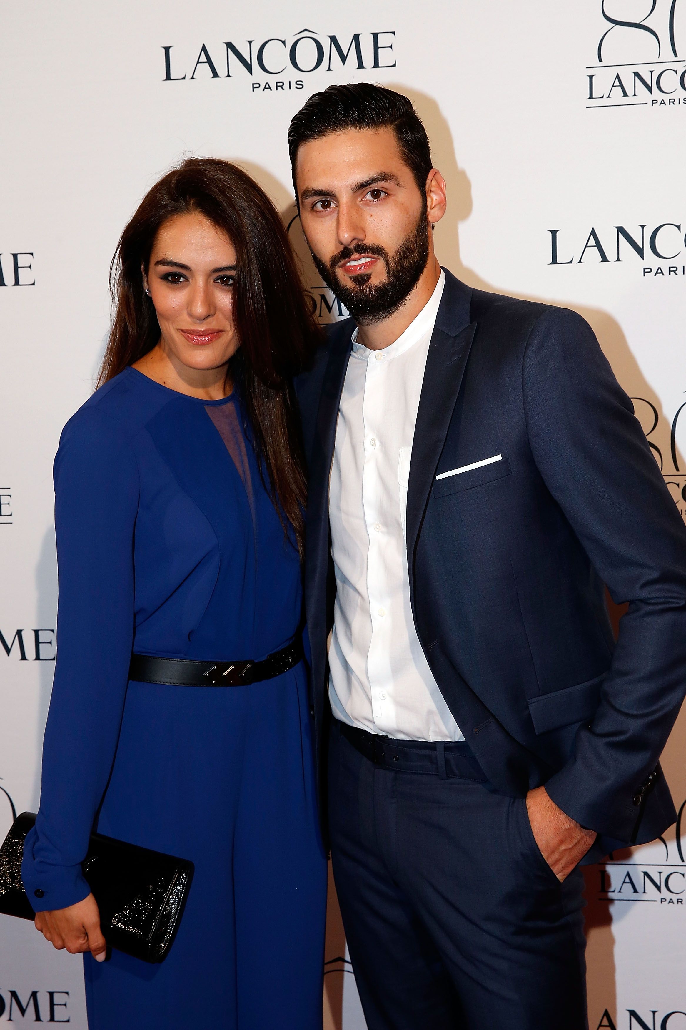 L'actrice Sofia Essaidi et son partenaire Adrien Galo assistent à la fête du 80e anniversaire de Lancôme dans le cadre de la Fashion Week de Paris Haute Couture Automne / Hiver 2015/2016 le 7 juillet 2015. | Photo : Getty Images