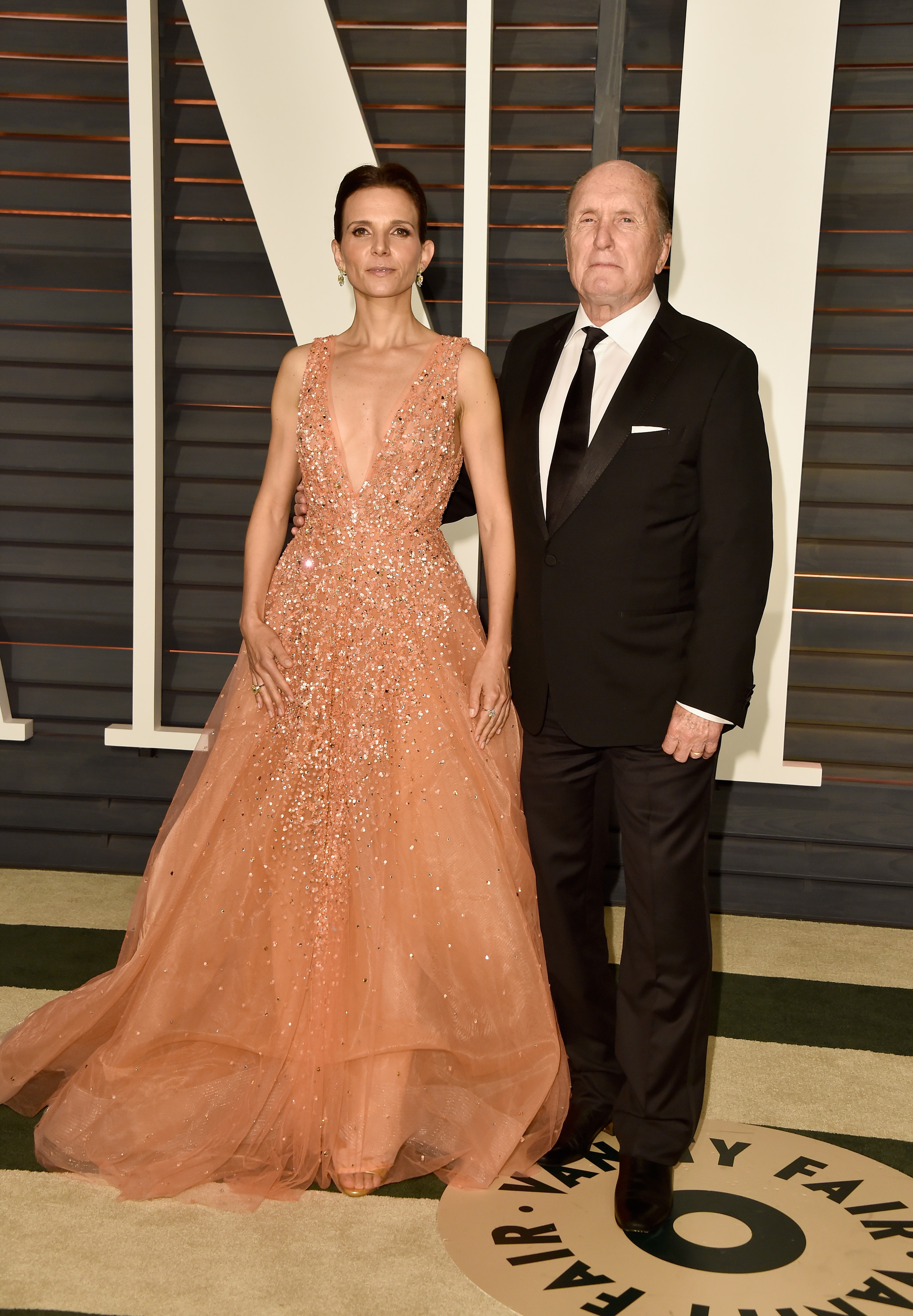 Luciana et Robert Duvall à la soirée Vanity Fair Oscar Party à Beverly Hills, Californie, le 22 février 2015. | Source : Getty Images