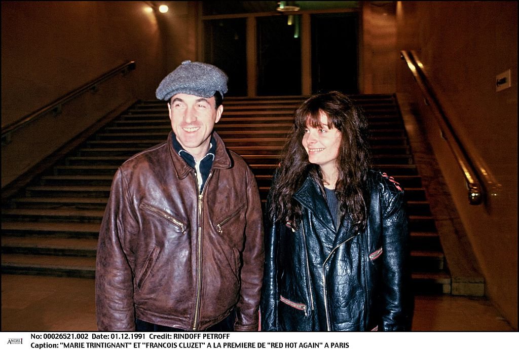 Marie Trintignant et François Cluzet à la première de "Red Hot Again" à Paris | Photo : Getty Images
