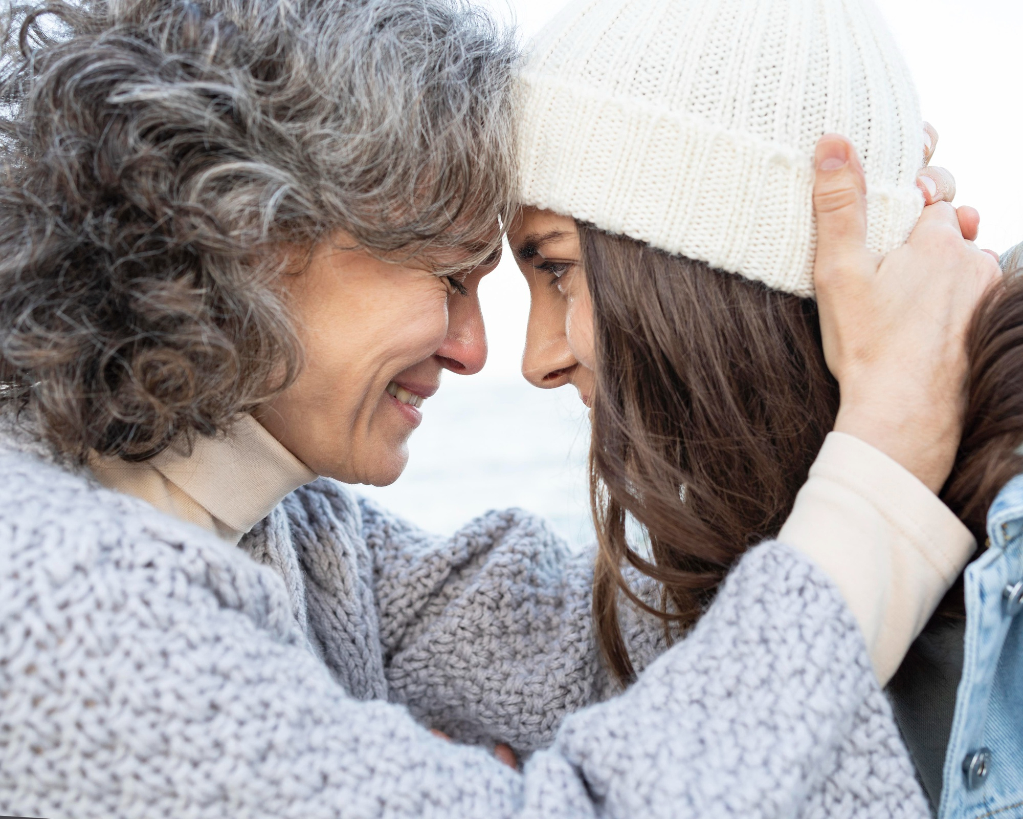 An older woman comforting a younger one | Source: Freepik