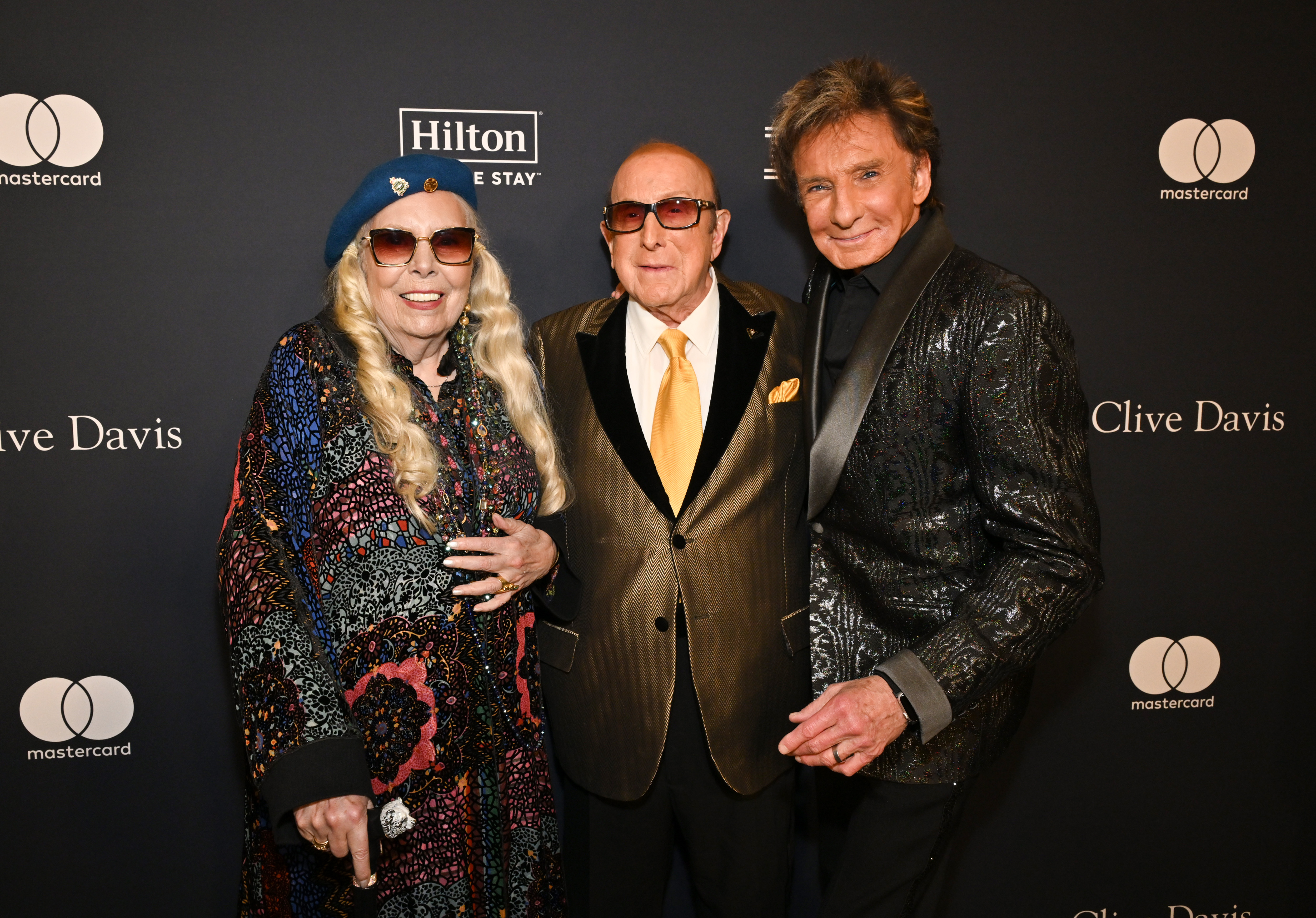 Joni Mitchell, Clive Davis et Barry Manilow. | Source : Getty Images