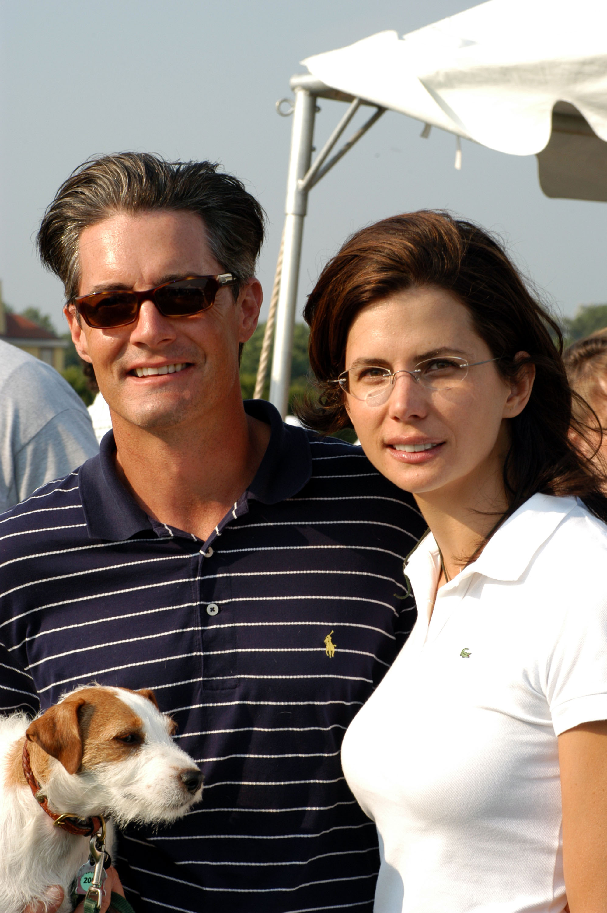 Kyle MacLaghlan et Desiree Gruber lors du Mercedes-Benz Polo Challenge le 26 juin 2003 à Bridgehampton, New York. | Source : Getty Images