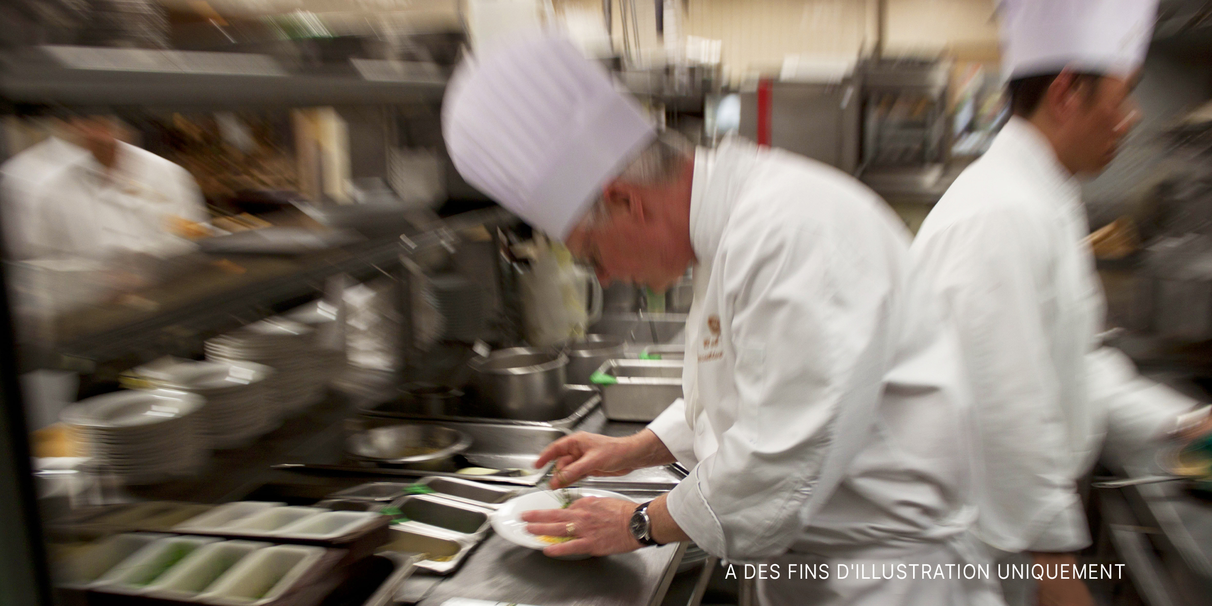 Des chefs cuisinant dans la cuisine | Source : Flickr / ppacificvancouver (CC BY 2.0)