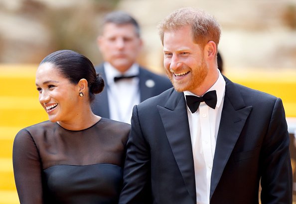 Le Duc et la Duchesse de Sussex durant la grande première du "Roi Lion" à Londres | Getty Images
