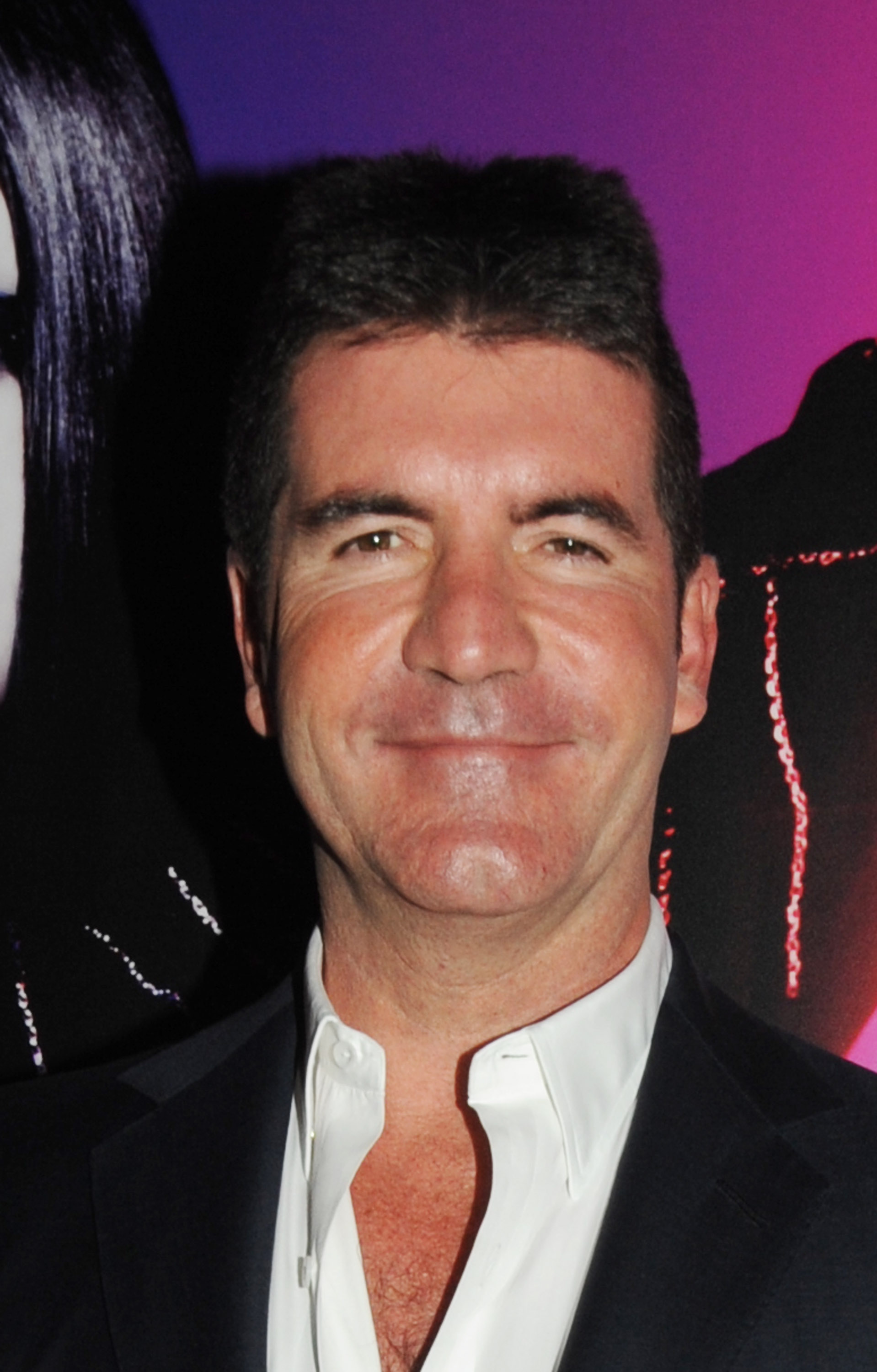 Simon Cowell à la soirée de lancement de Beth Ditto For Evans le 1er juillet 2009 | Source : Getty Images