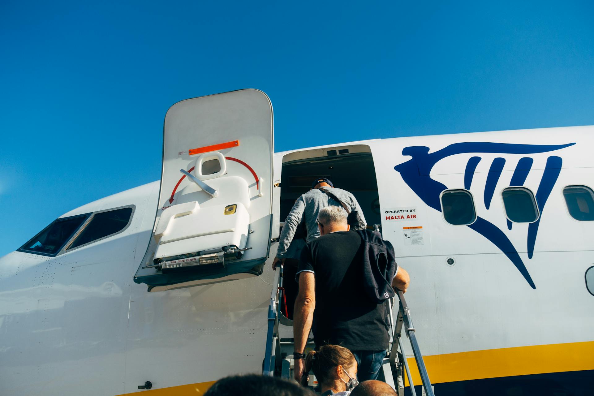 People boarding a plane | Source: Pexels