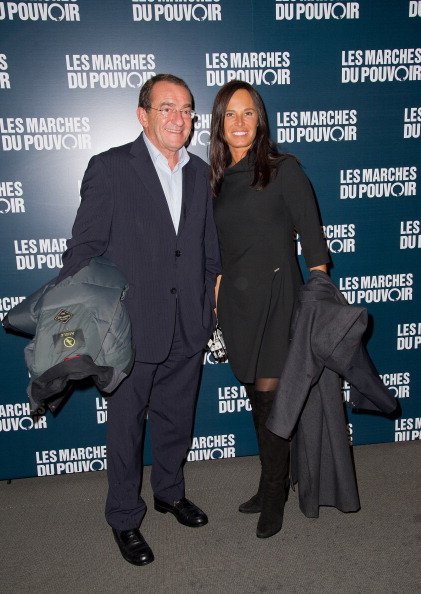 Jean-Pierre Pernaut et Nathalie Marquay assistent à la première parisienne de "Les Ides de Mars" au Cinéma. |Photo : Getty Images