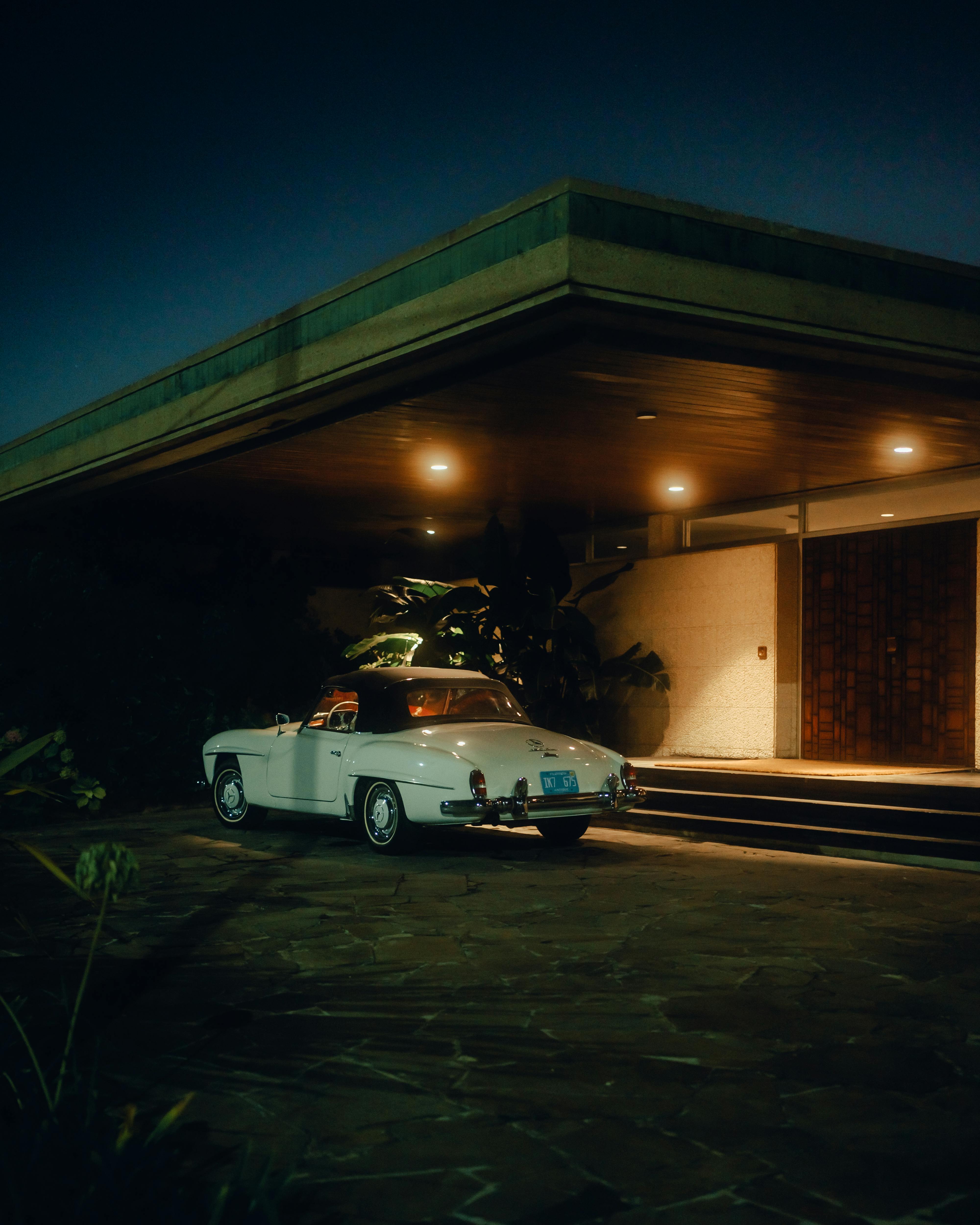 A classic car parked in front of a house | Source: Pexels