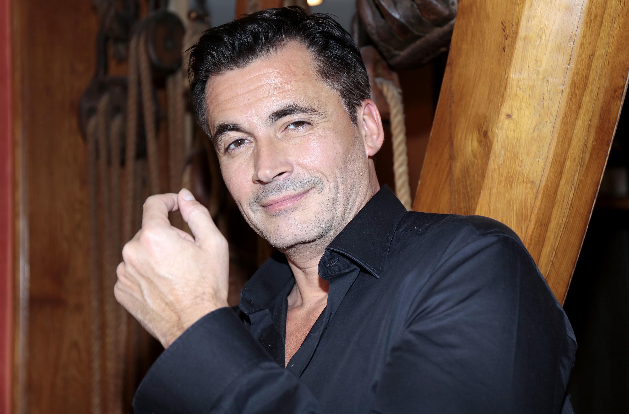 Le présentateur Olivier Minne photographié à Paris I Source : Getty Images