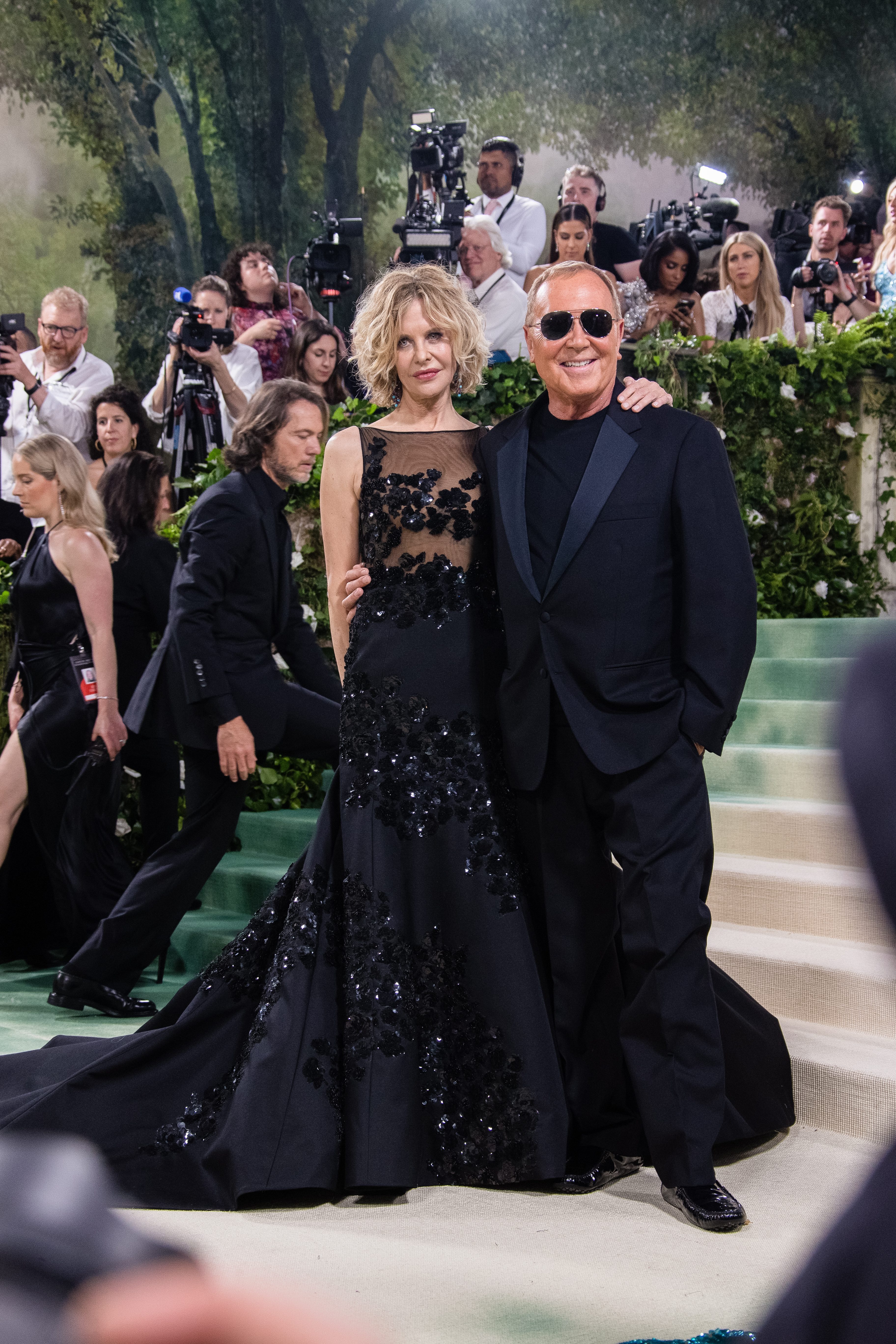 Meg Ryan et Michael Kors. | Source : Getty Images