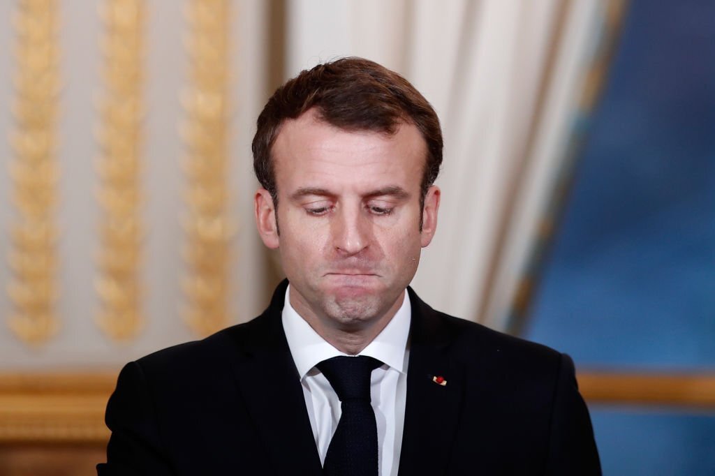 Emmanuel Macron réagit lors d'une conférence de presse conjointe avec le président du Burkina Faso à l'Élysée, à Paris, le 17 décembre 2018, à l'issue de leur rencontre. | Photo : Getty Images