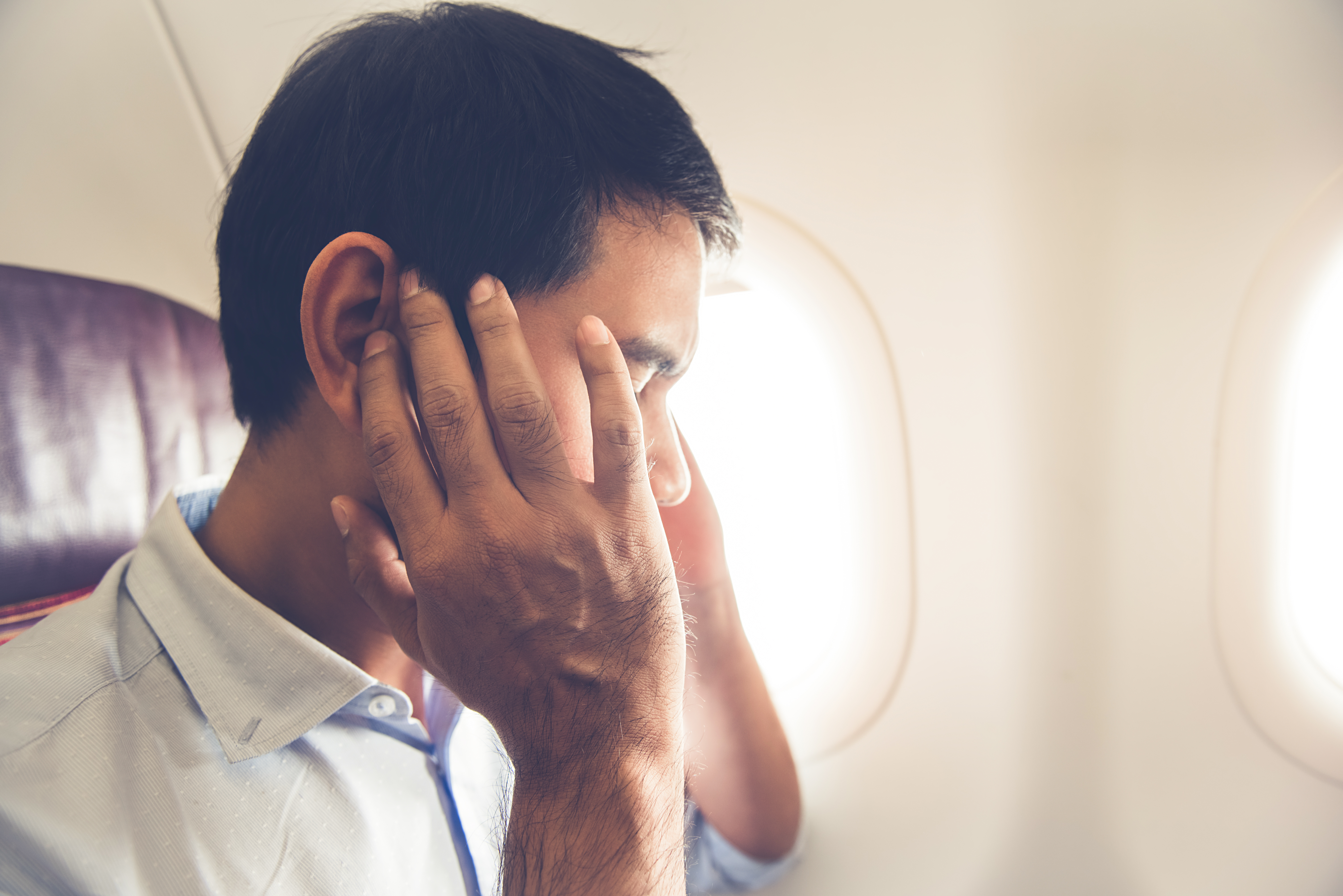 Un passager d'avion frustré | Source : Shutterstock