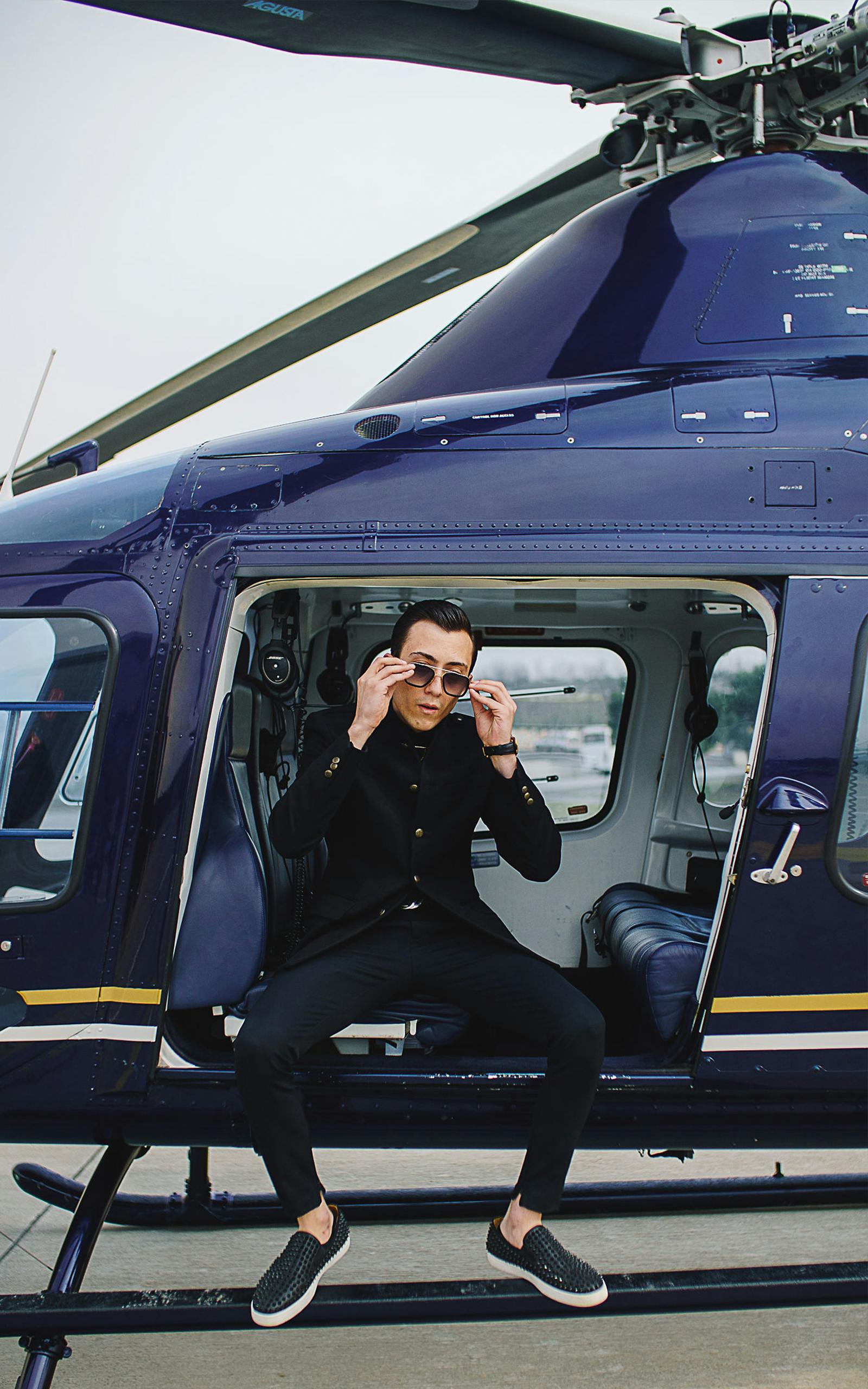 Un jeune homme riche dans un hélicoptère | Source : Pexels