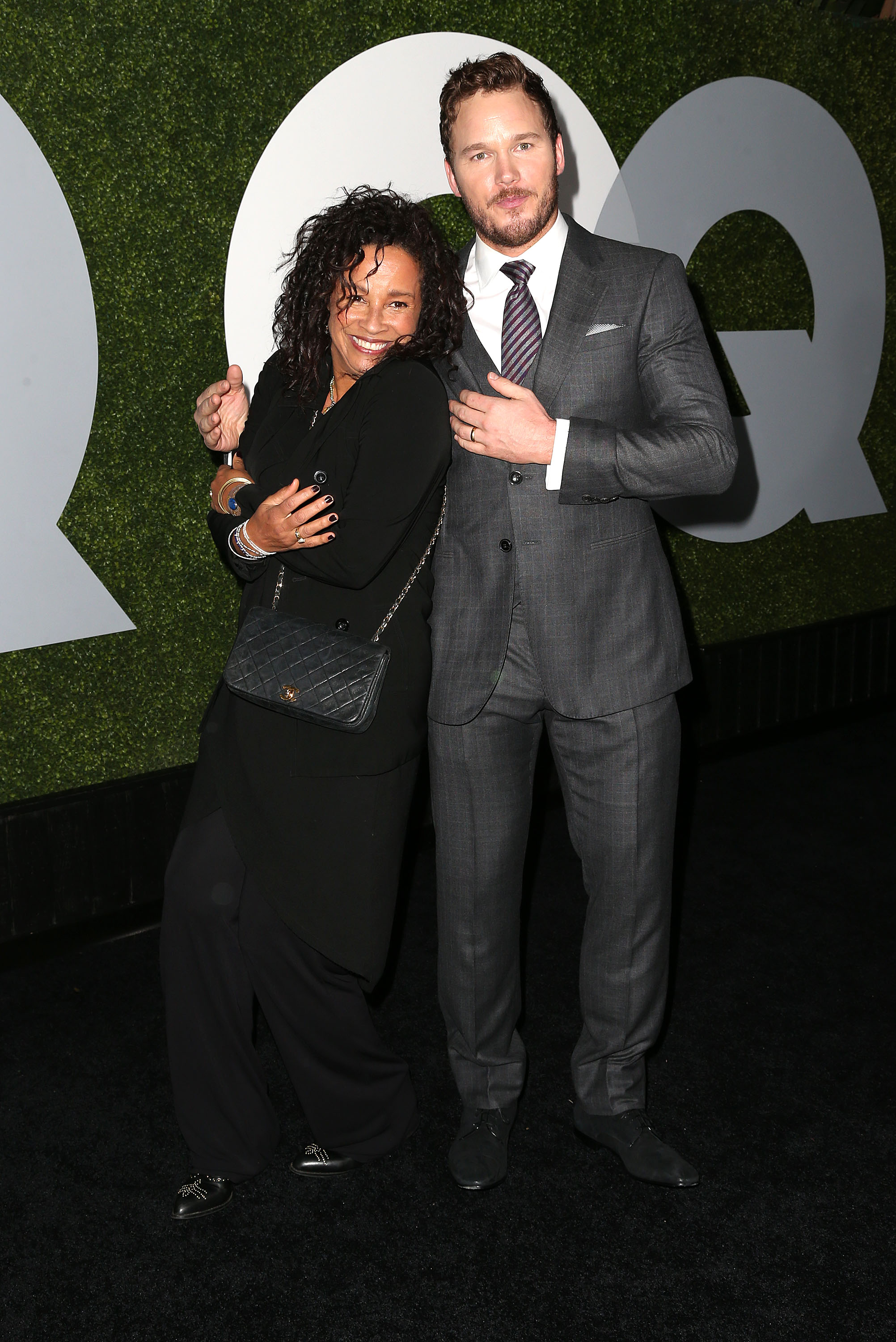 Rae Dawn Chong et Chris Pratt assistant à une soirée GQ le 4 décembre 2014 à Hollywood, Californie | Source : Getty Images